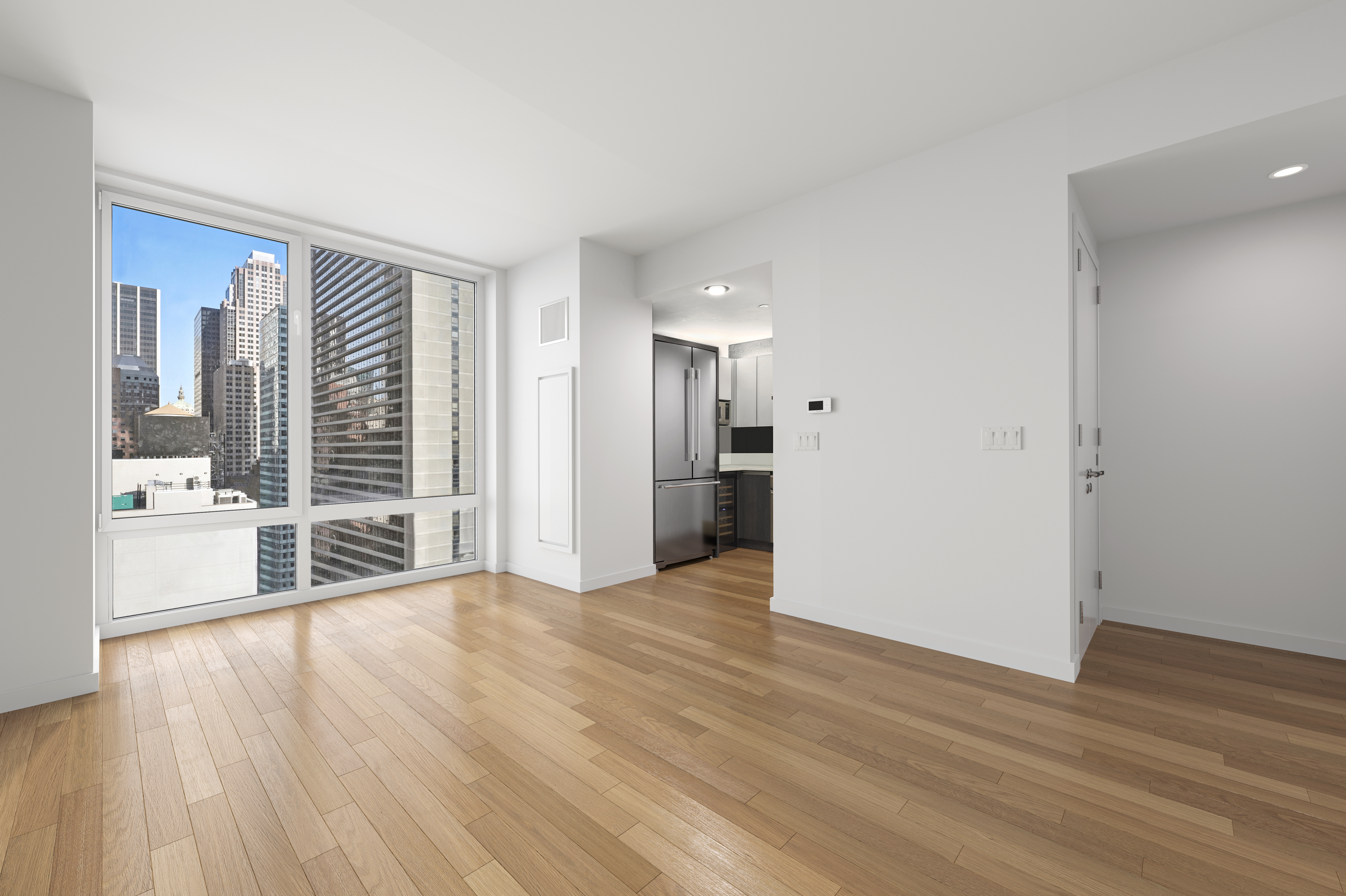 247 West 46th Street, Unit 2305 Manhattan, NY 10036 - Photo 4 of 13 a view of an empty room with wooden floor and a window