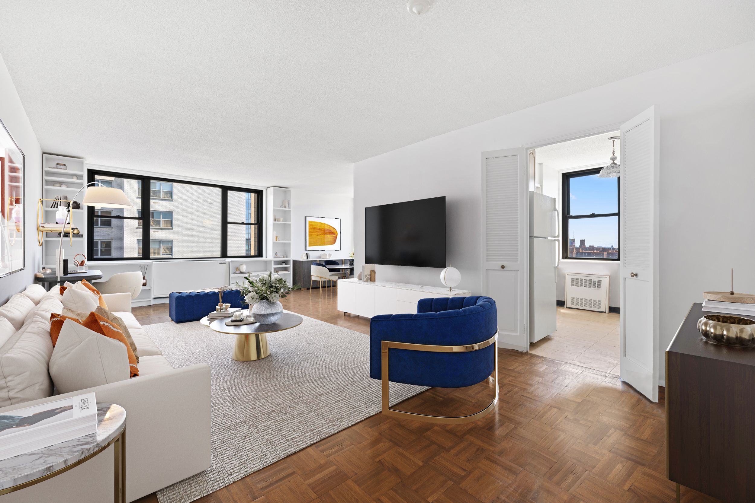 201 East 17th Street, Unit 15H Manhattan, NY 10003 - Photo 2 of 24 a living room with furniture and a flat screen tv