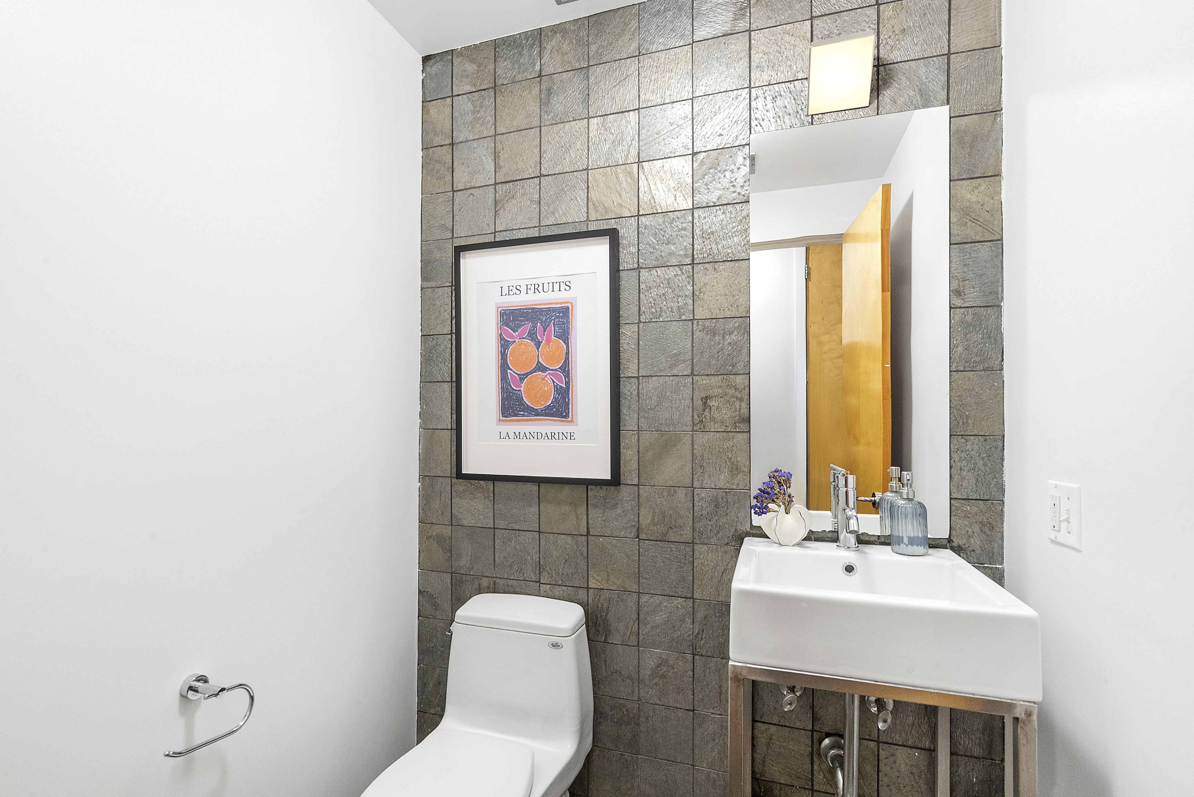 201 Spencer Street, Unit 3A Brooklyn, NY 11205 - Photo 10 of 11 a bathroom with a sink and a mirror