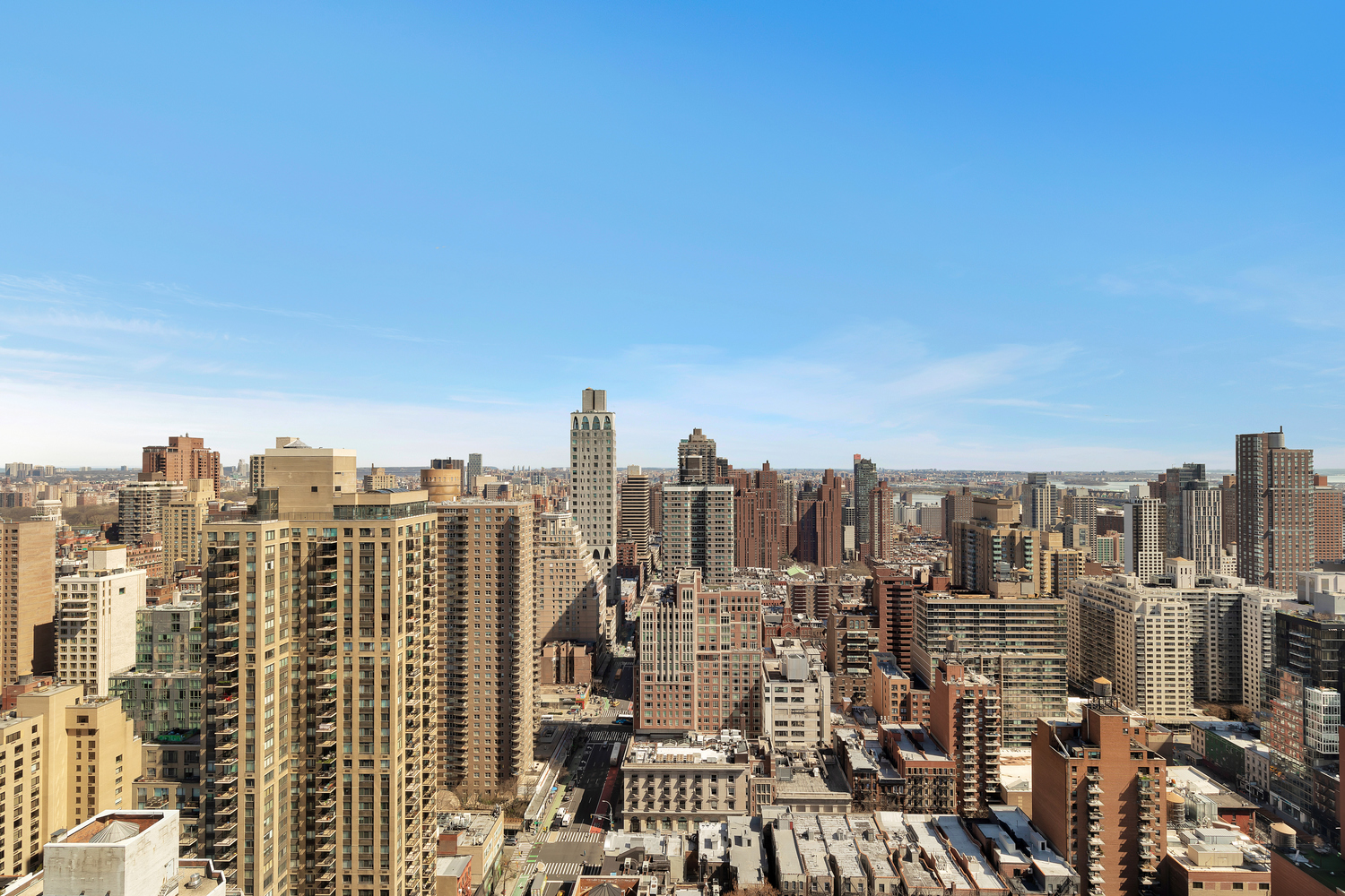 200 East 83rd Street, Unit 34A Manhattan, NY 10028 - Photo 23 of 34 a view of a city with tall buildings in the background