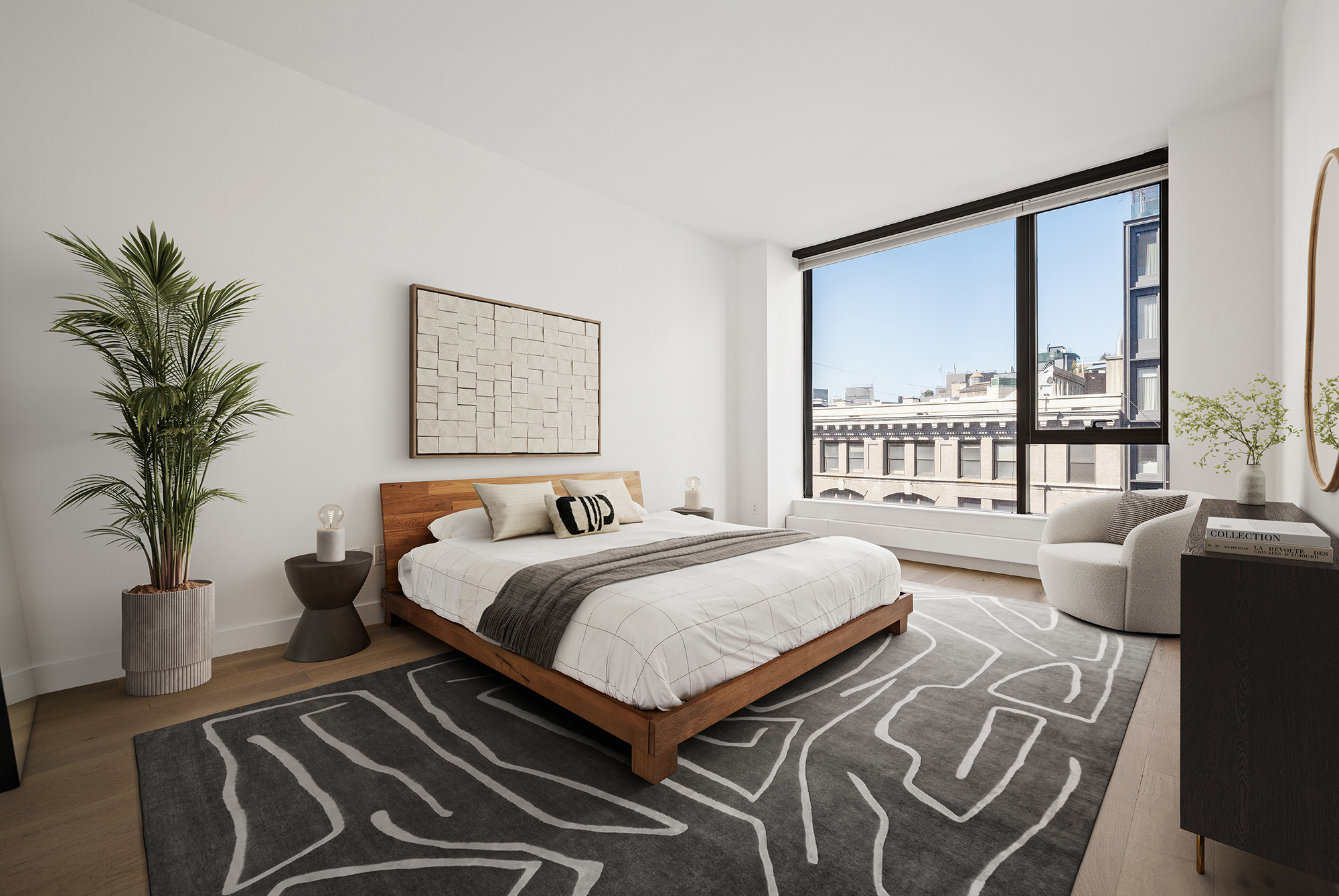 255 Hudson Street, Unit 7C Manhattan, NY 10013 - Photo 6 of 9 a bedroom with a large bed and a potted plant