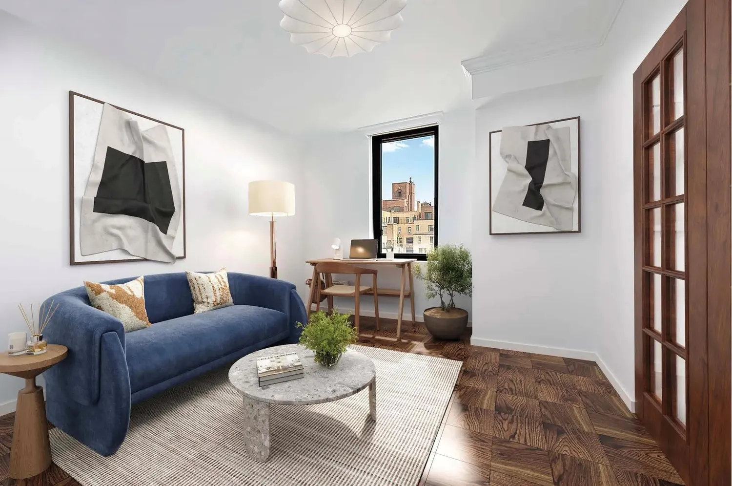 a living room with furniture and a wooden floor