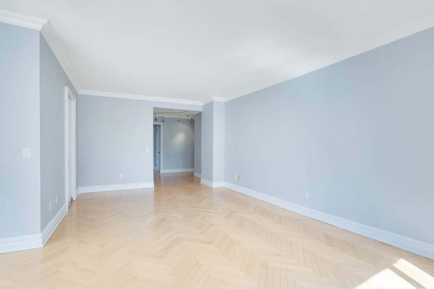 a view of an empty room and window