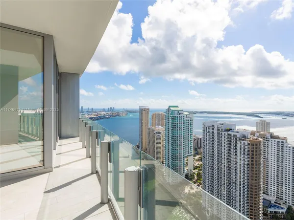a view of a balcony with city view