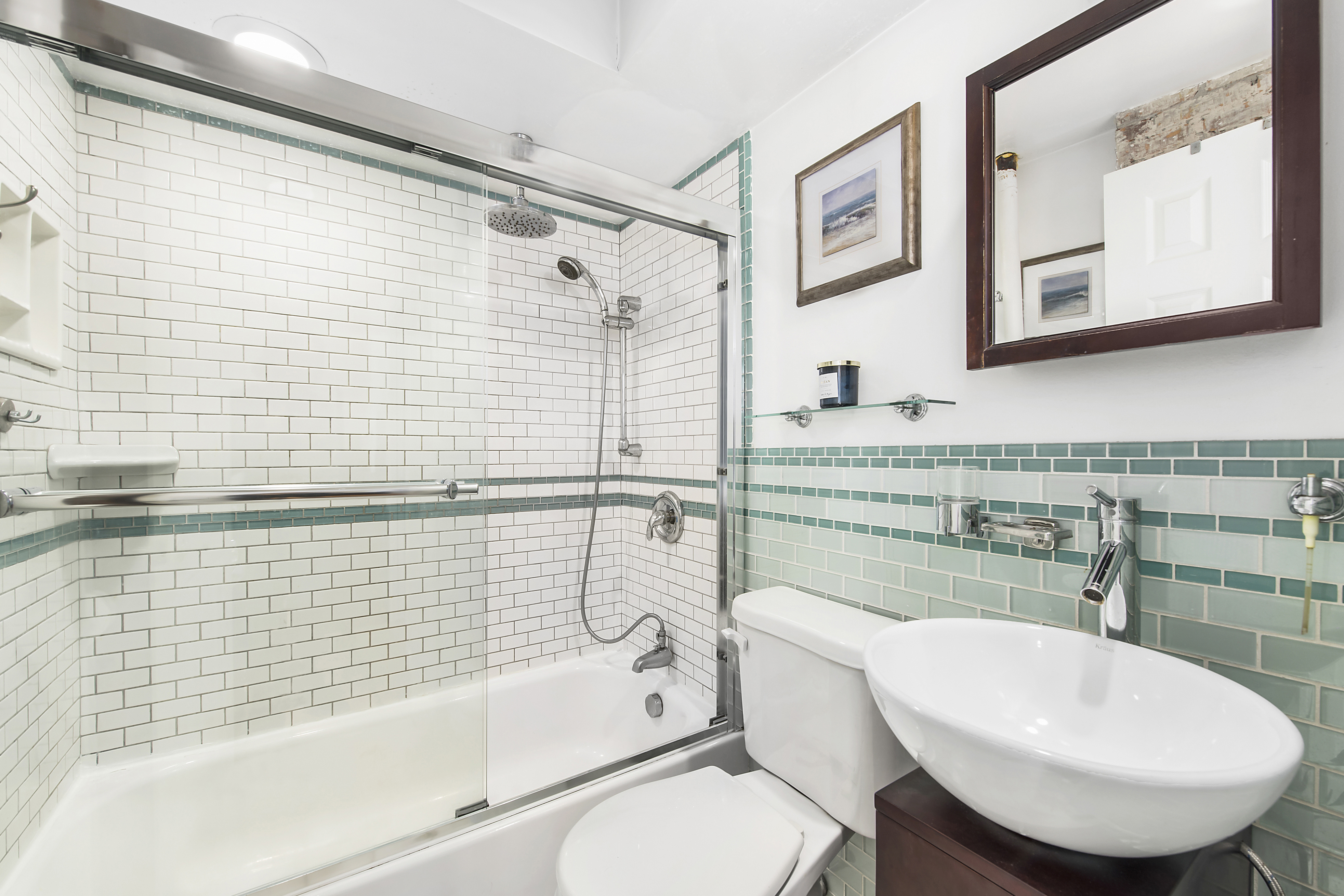 131 West 85th Street, Unit 2A Manhattan, NY 10024 - Photo 4 of 6 a bathroom with a bathtub and sink