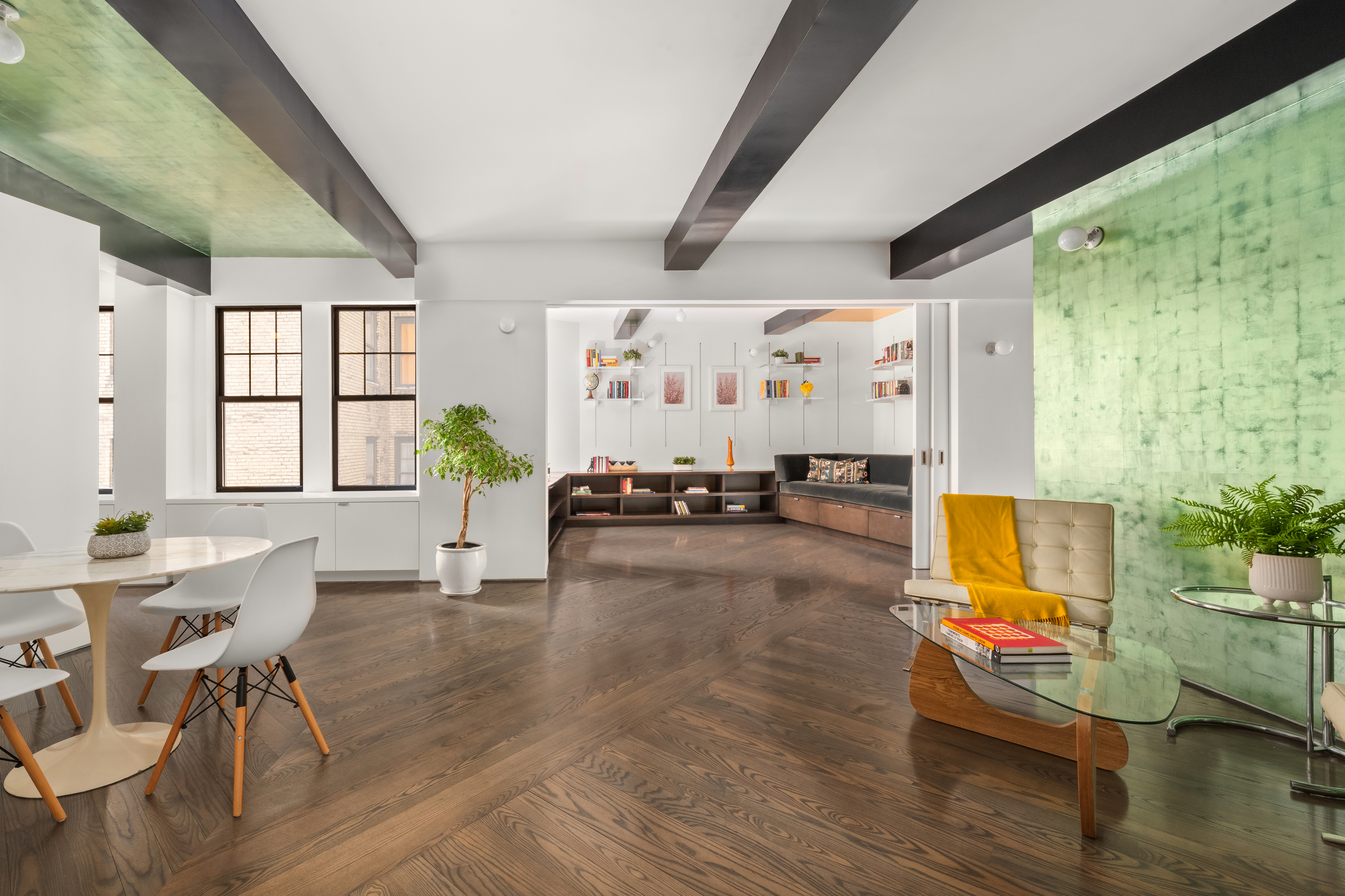 170 2nd Avenue, Unit 5A Manhattan, NY 10003 - Photo 1 of 12 a living room with furniture and a flat screen tv