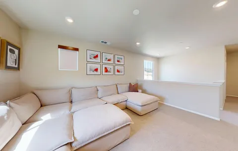 a view of a hallway with washer and dryer