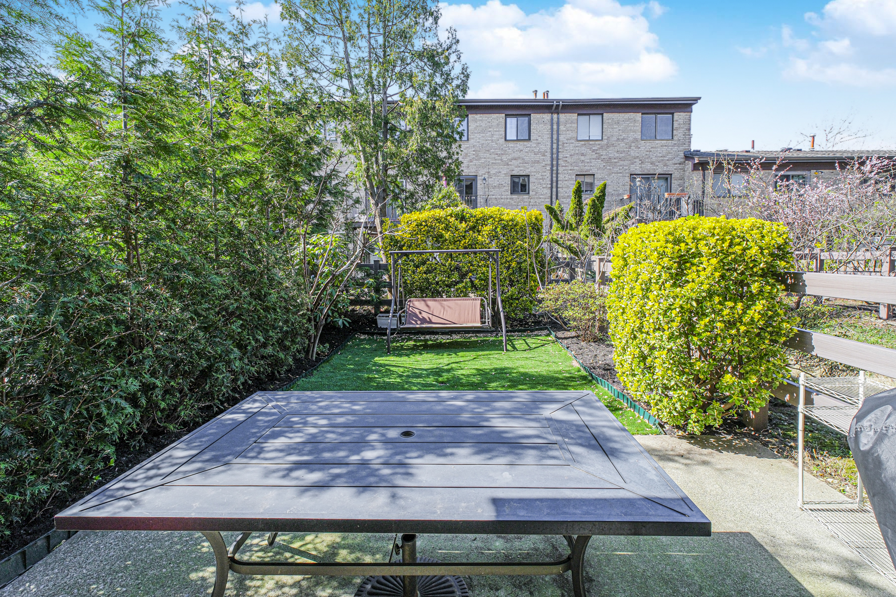 97 Dogwood Lane Staten Island, NY 10305 - Photo 19 of 22 a view of a house with a yard and a patio