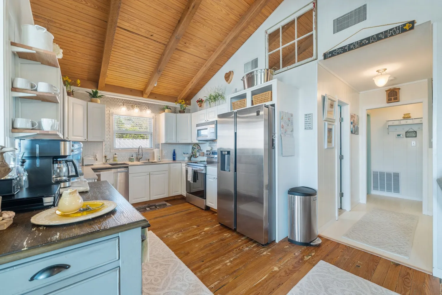 a kitchen with refrigerator and countertop