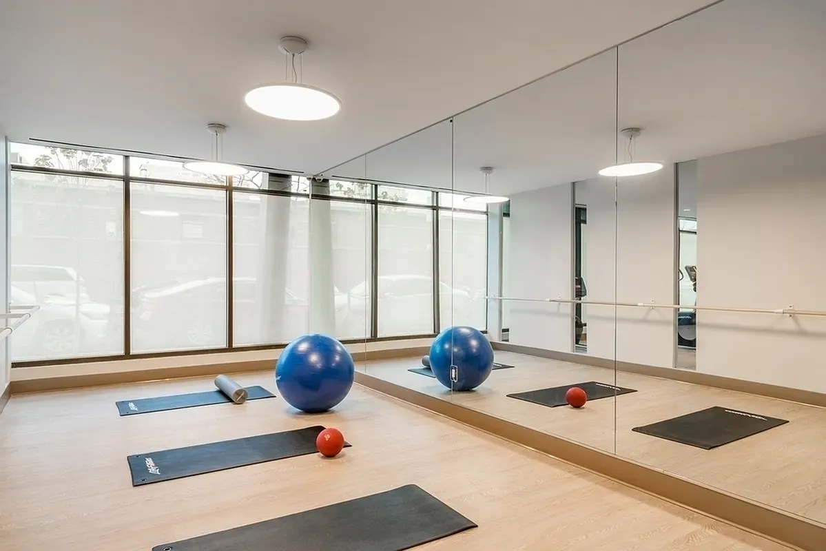 a living room with a couch and a large window