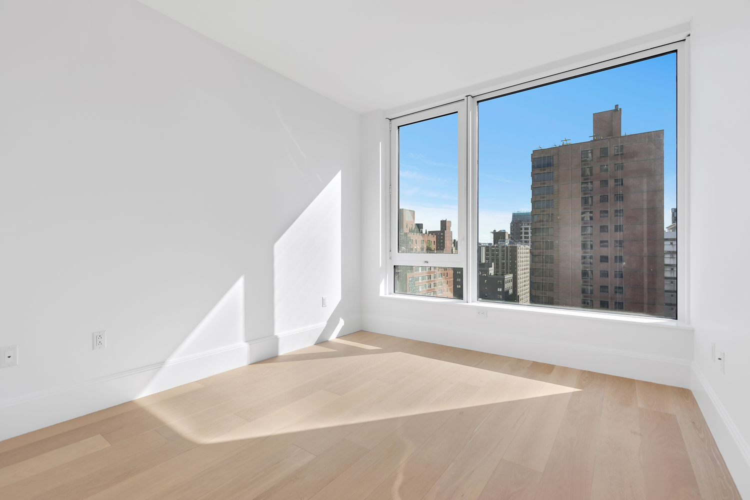 368 3rd Avenue, Unit 15C Manhattan, NY 10016 - Photo 6 of 17 a view of a big room with windows