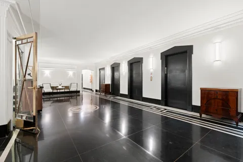 a view of a living room and bathroom
