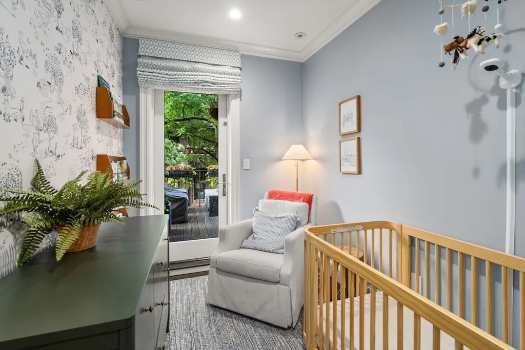 a view of a patio with table and chairs and potted plants