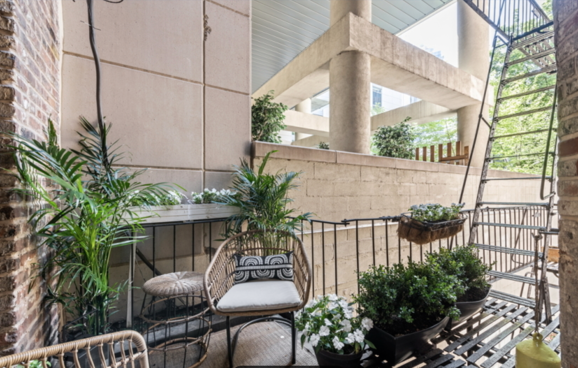 57 Thompson Street, Unit 2CD Manhattan, NY 10012 - Photo 4 of 13 a view of balcony with wooden floor and outdoor seating