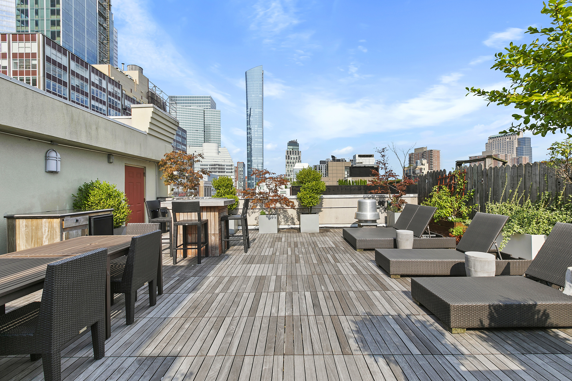 25 Murray Street, Unit 4A Manhattan, NY 10007 - Photo 7 of 11 a view of a balcony with chairs and wooden floor