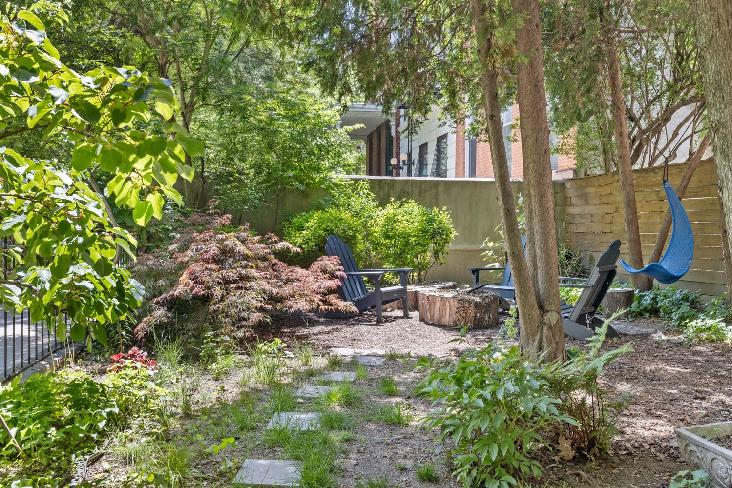 110 Clinton Avenue, Unit 1A Brooklyn, NY 11205 - Photo 7 of 9 a view of a house with backyard sitting area and garden