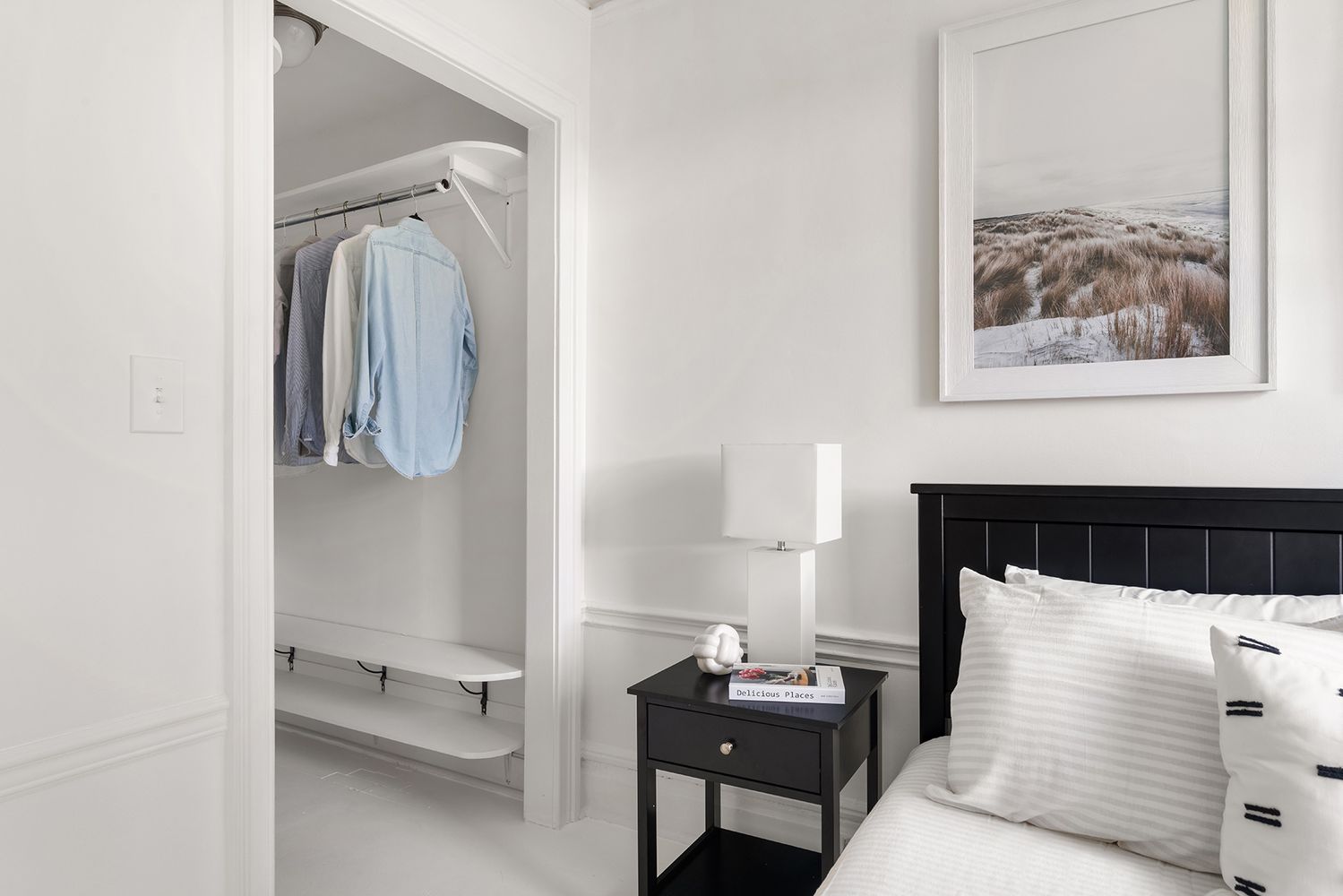 30-32 West 9th Street, Unit 5A Manhattan, NY 10011 - Photo 8 of 18 a bedroom with a bed and a painting on the wall