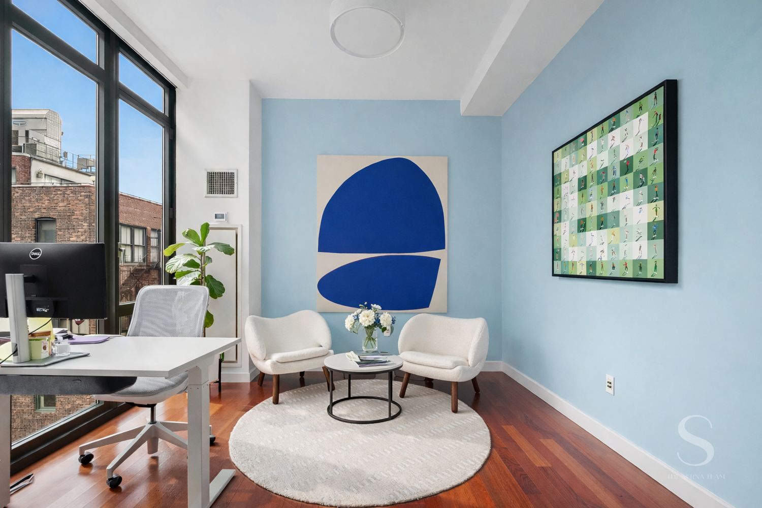 4 West 21st Street, Unit 14A Manhattan, NY 10010 - Photo 3 of 16 a workspace with furniture and a potted plant