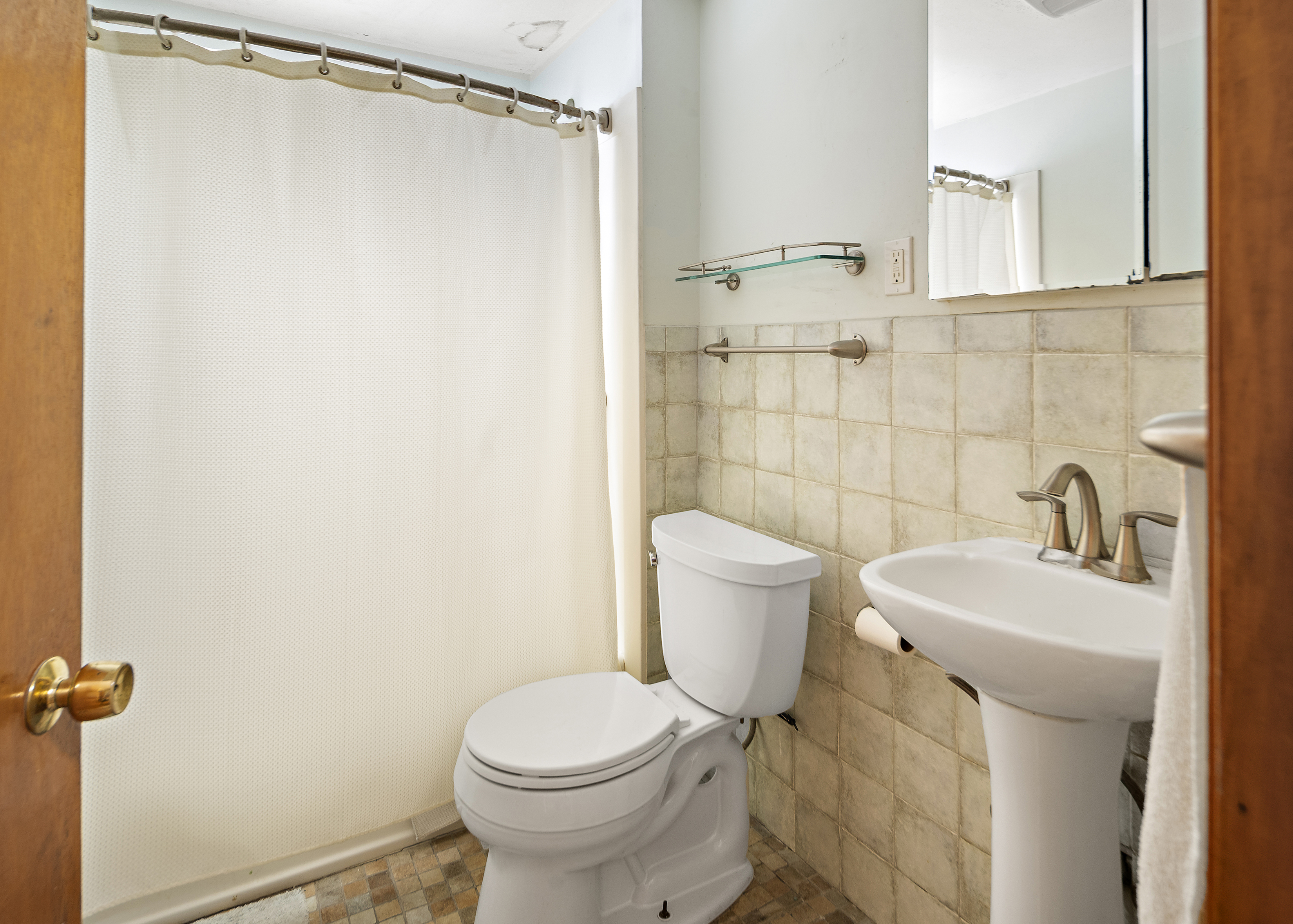 15 Harrington Road Cambridge, MA 02140 - Photo 9 of 17 a bathroom with a sink and a toilet