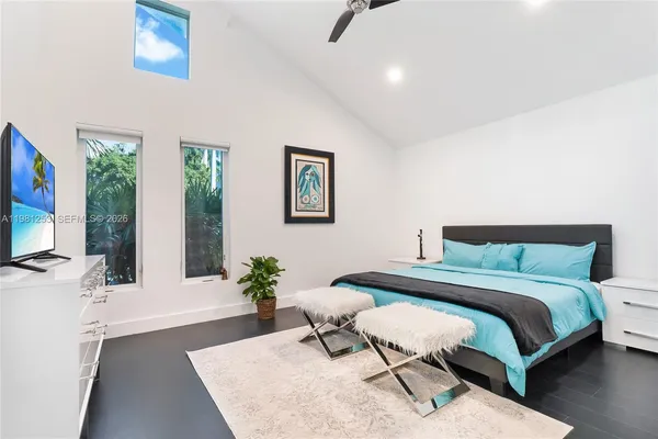 a bedroom with a bed and glass floor