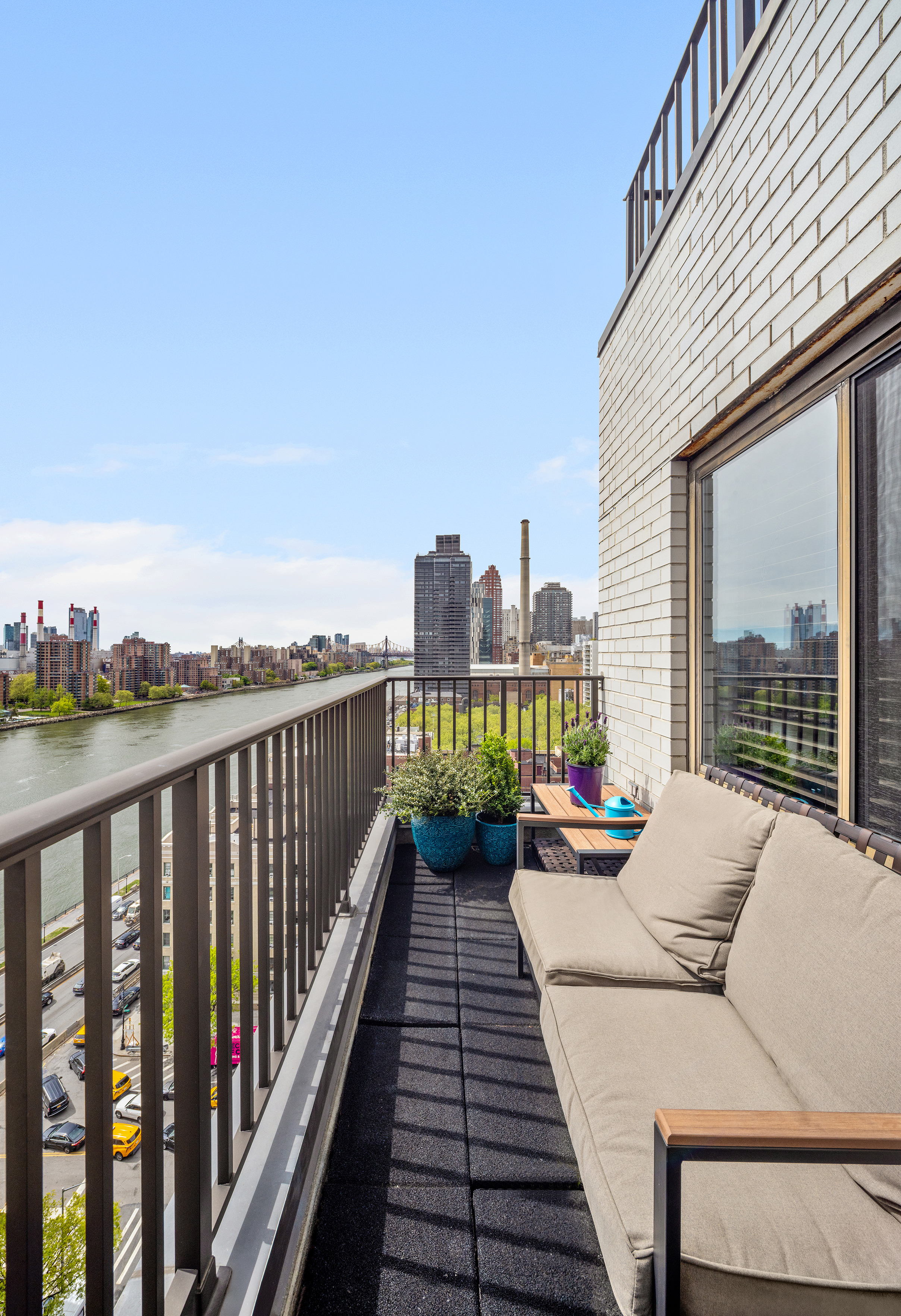 10 East End Avenue, Unit 18D Manhattan, NY 10075 - Photo 3 of 21 a view of a balcony with city view