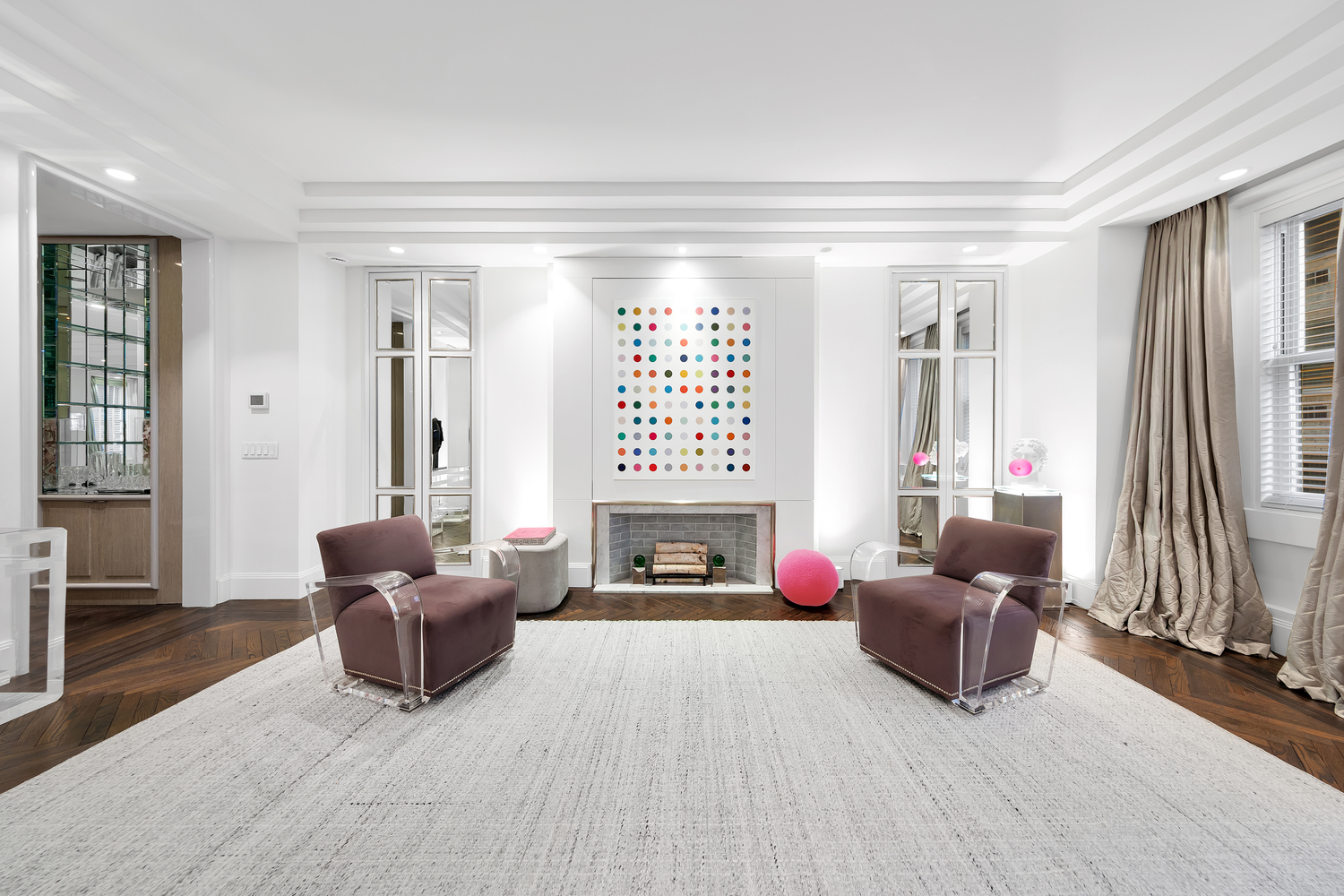 465 Park Avenue, Unit 9F Manhattan, NY 10022 - Photo 3 of 13 a living room with furniture fireplace and a flat screen tv