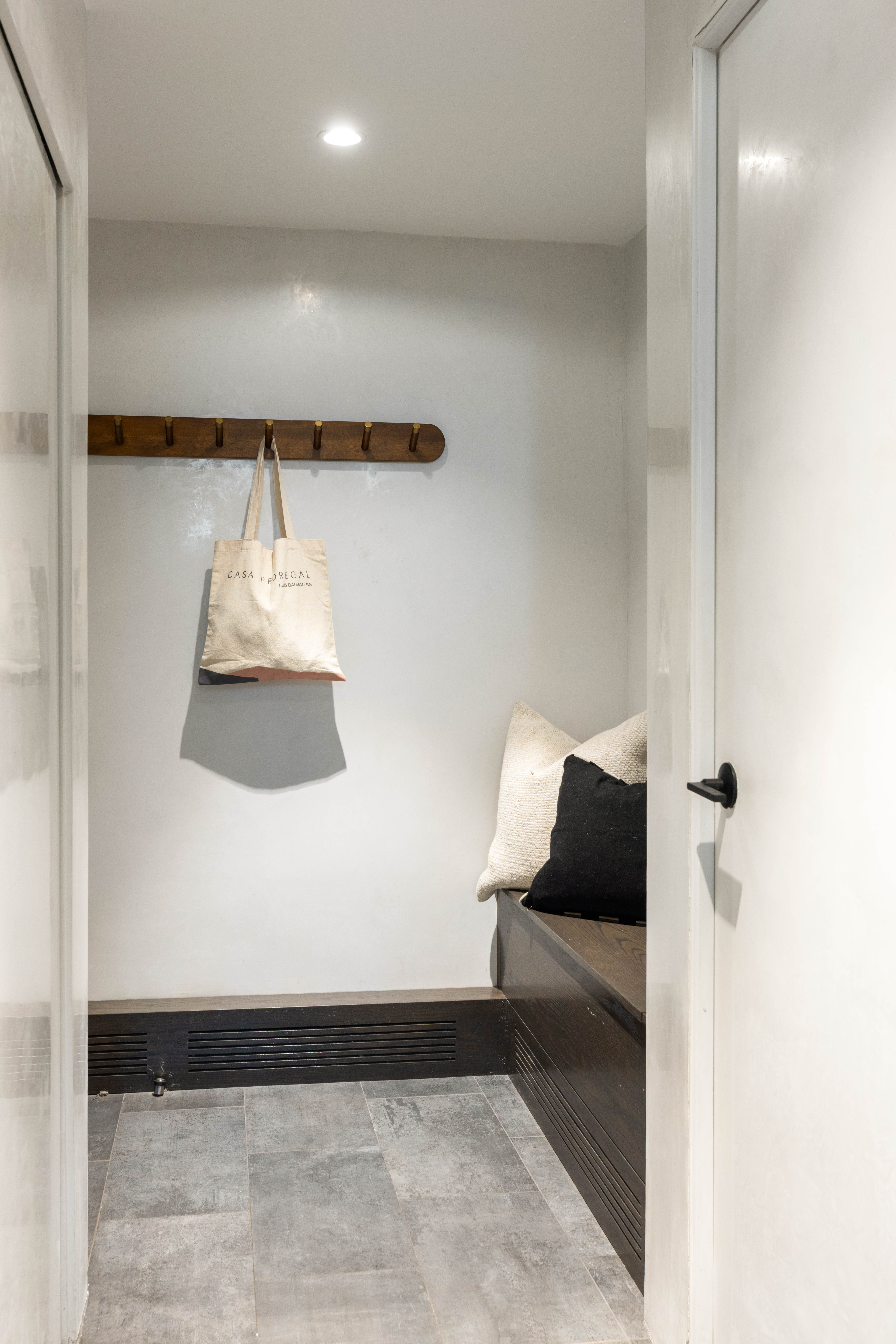 165 Perry Street, Unit 1D Manhattan, NY 10014 - Photo 11 of 13 a living room with a couch