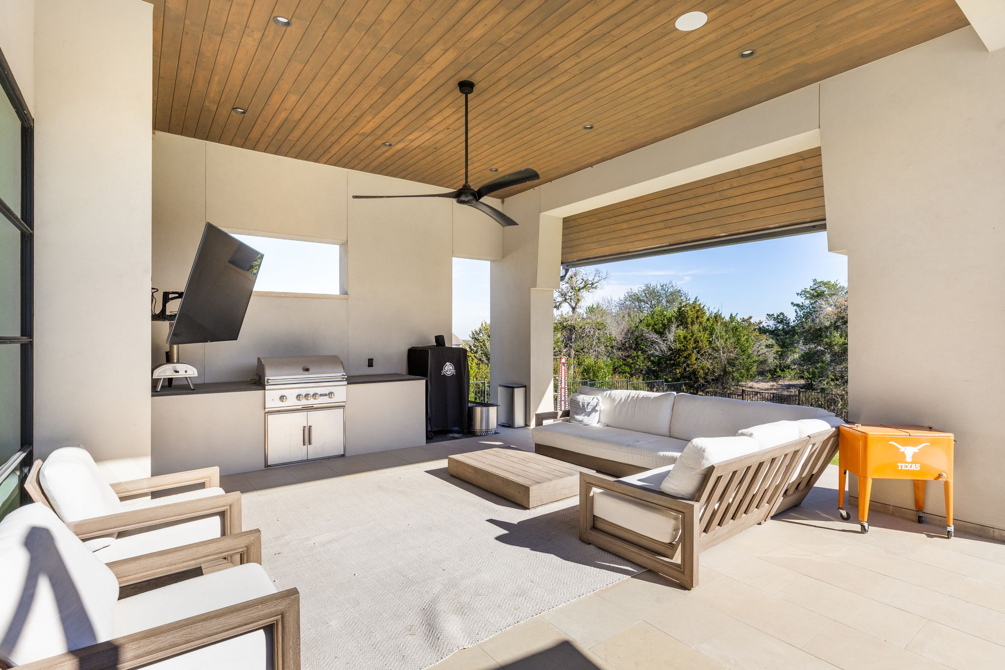 522 Delayne Drive Austin, TX 78737 - Photo 12 of 23 a living room with furniture and a flat screen tv