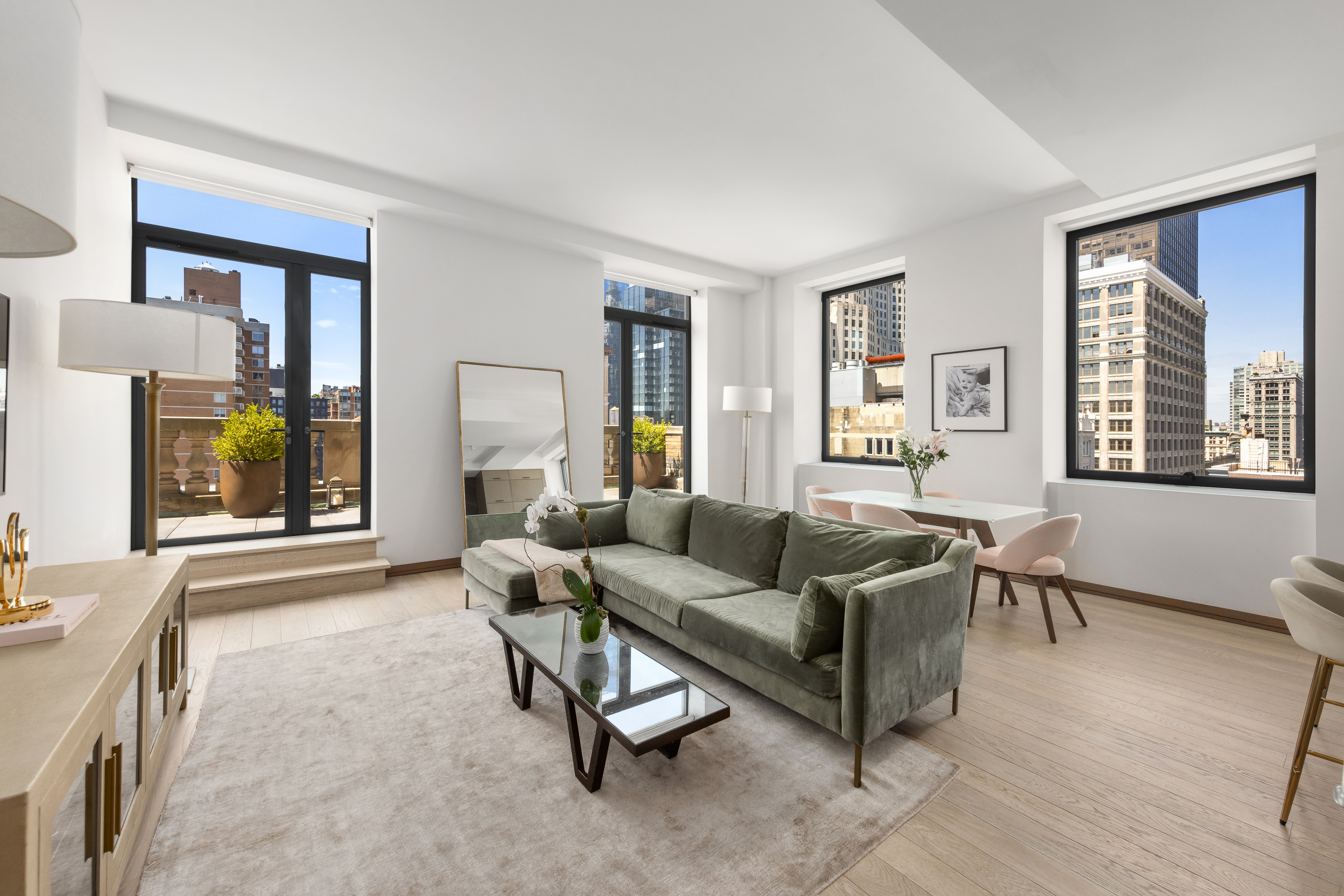 88 Lexington Avenue, Unit 1606 Manhattan, NY 10010 - Photo 6 of 20 a living room with furniture and a window