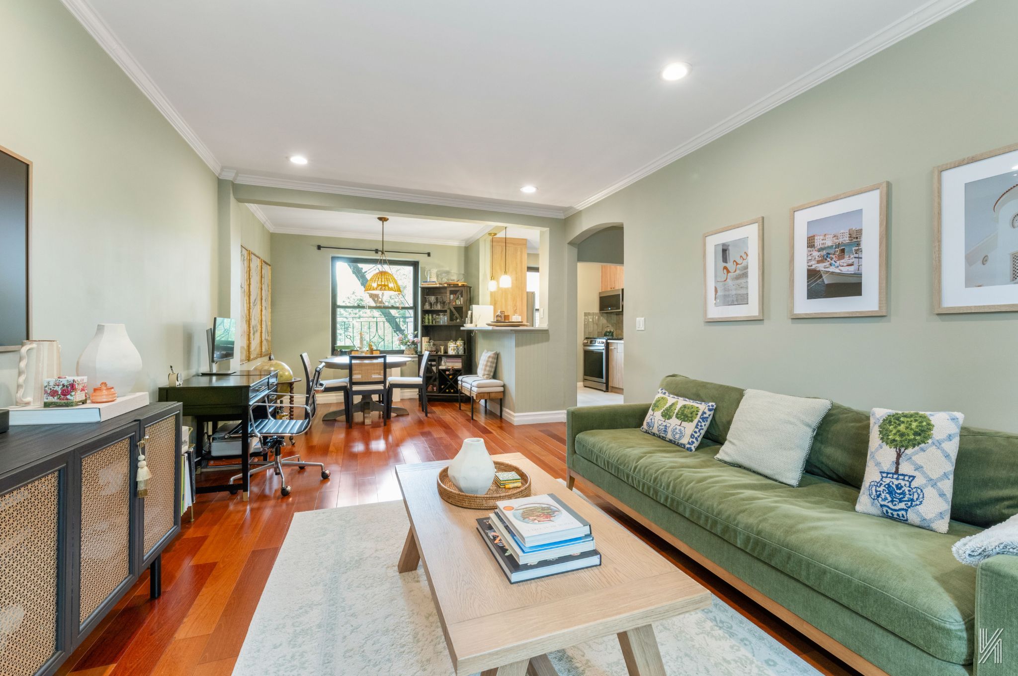 22-31 77th Street, Unit C2 Queens, NY 11370 - Photo 4 of 17 a living room with furniture and wooden floor