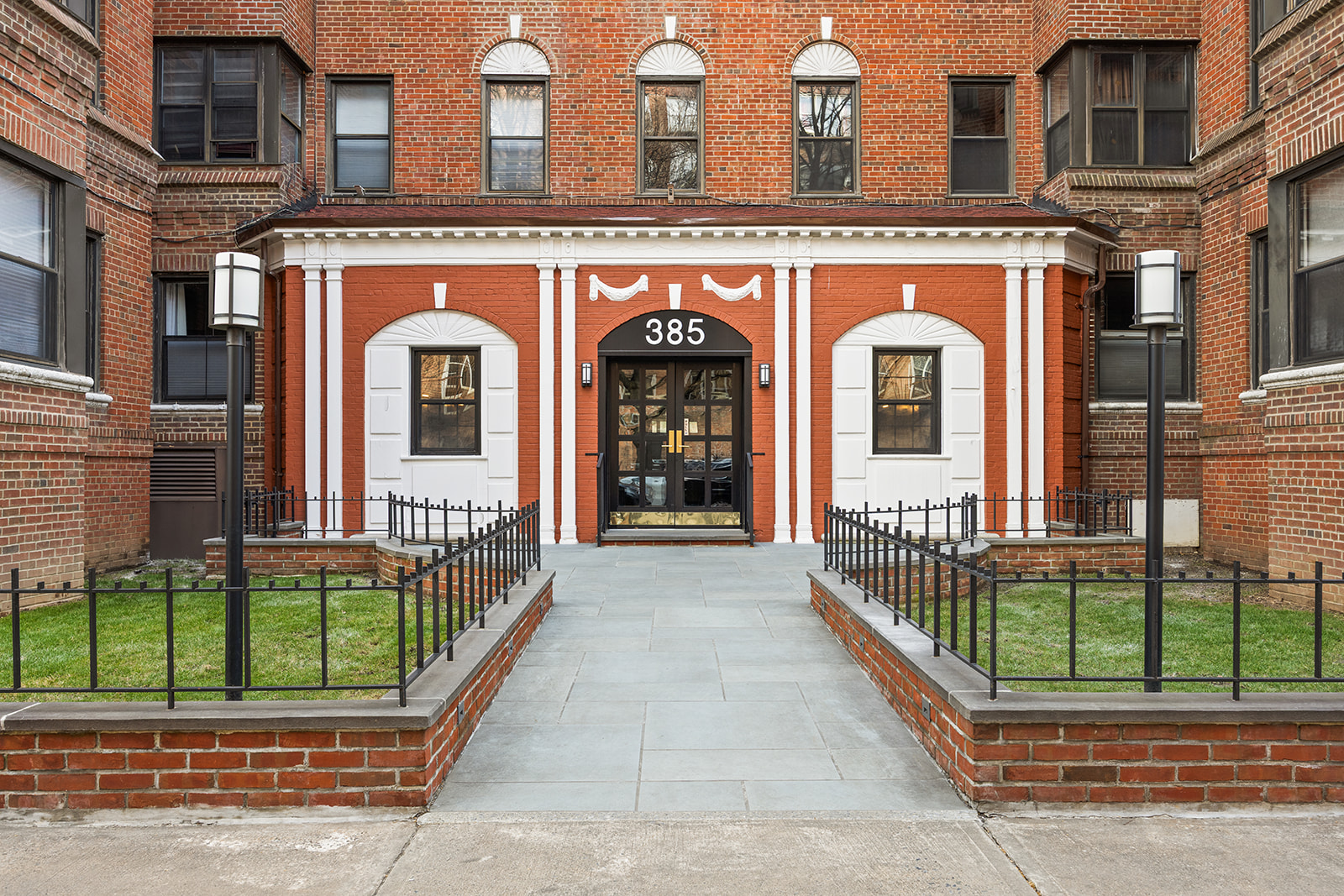 385 East 18th Street, Unit 4E Brooklyn, NY 11226 - Photo 6 of 7 a view of a brick building with a balcony