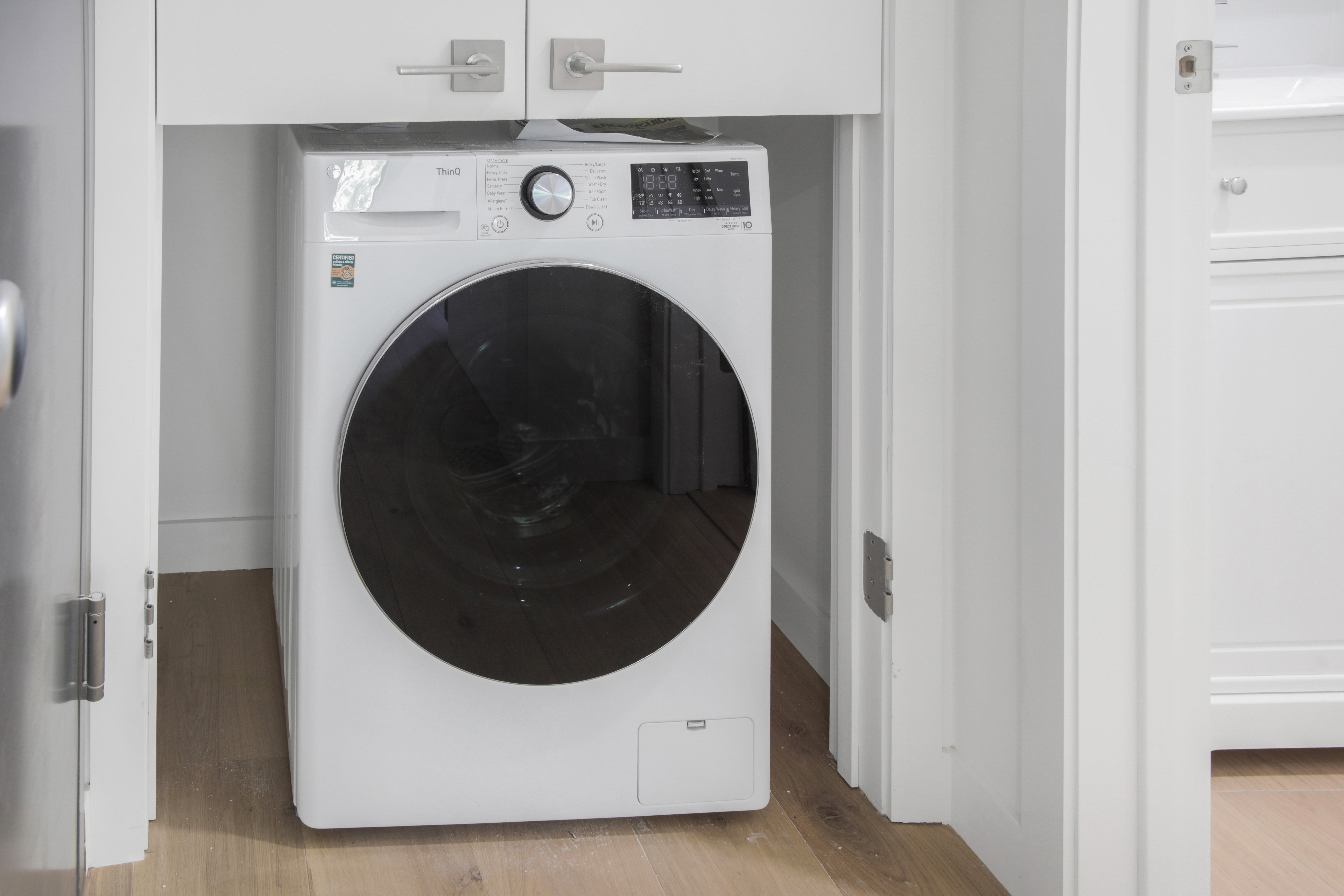 94 6th Avenue, Unit 3R Brooklyn, NY 11217 - Photo 7 of 12 a utility room with dryer and washer