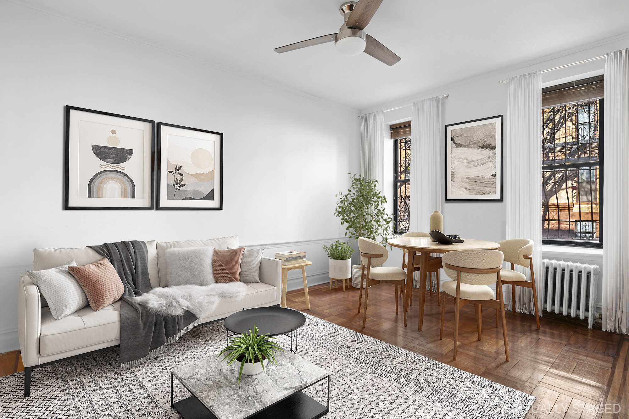 a living room with furniture and wooden floor