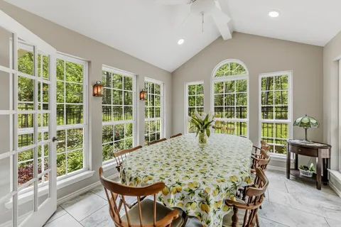 a living room with large windows