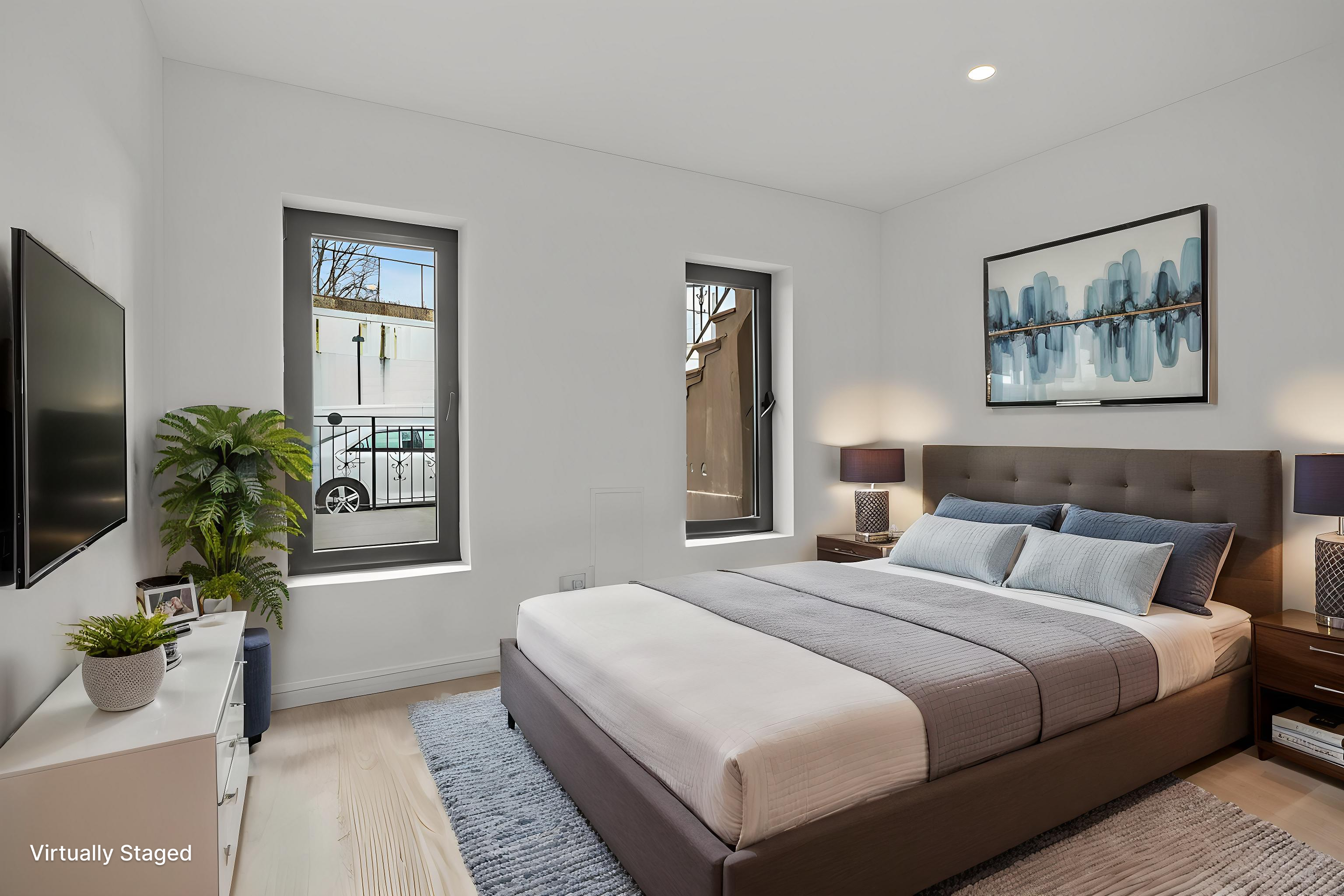 320 10th Street Brooklyn, NY 11215 - Photo 29 of 41 a bedroom with bed and a potted plant