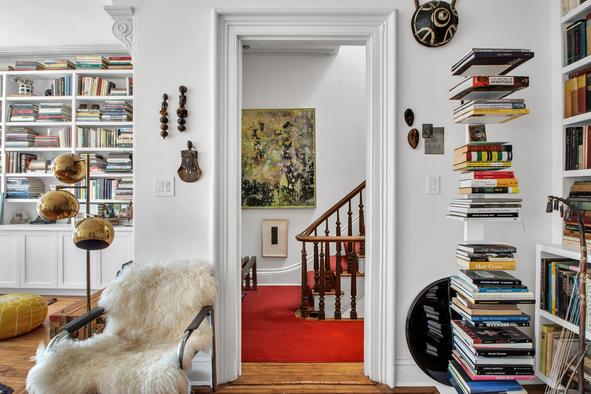 383 Grand Avenue Brooklyn, NY 11238 - Photo 17 of 32 a view of a bedroom with furniture and book shelf