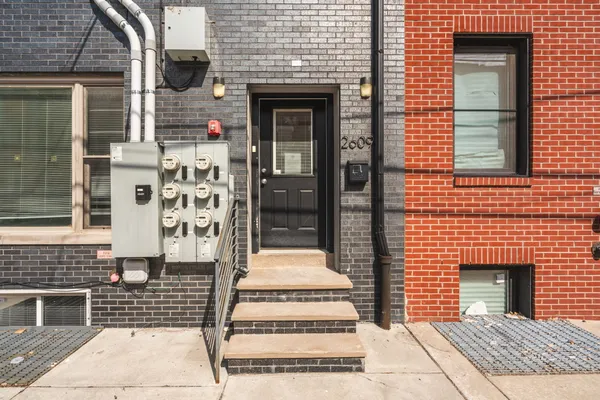 a view of entryway with a brick wall