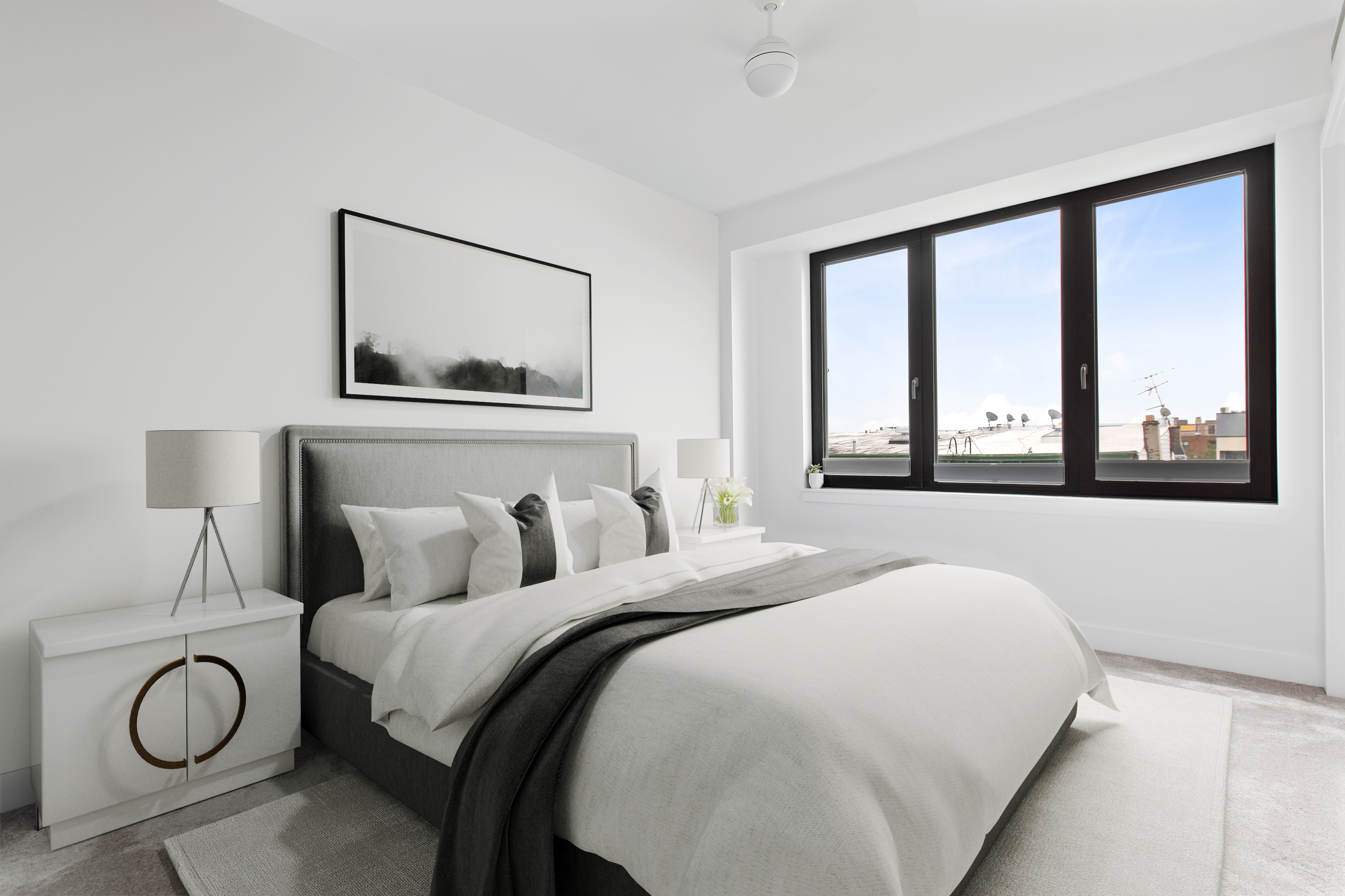 42 Sharon Street Brooklyn, NY 11211 - Photo 19 of 28 a bedroom with a large bed and a large window