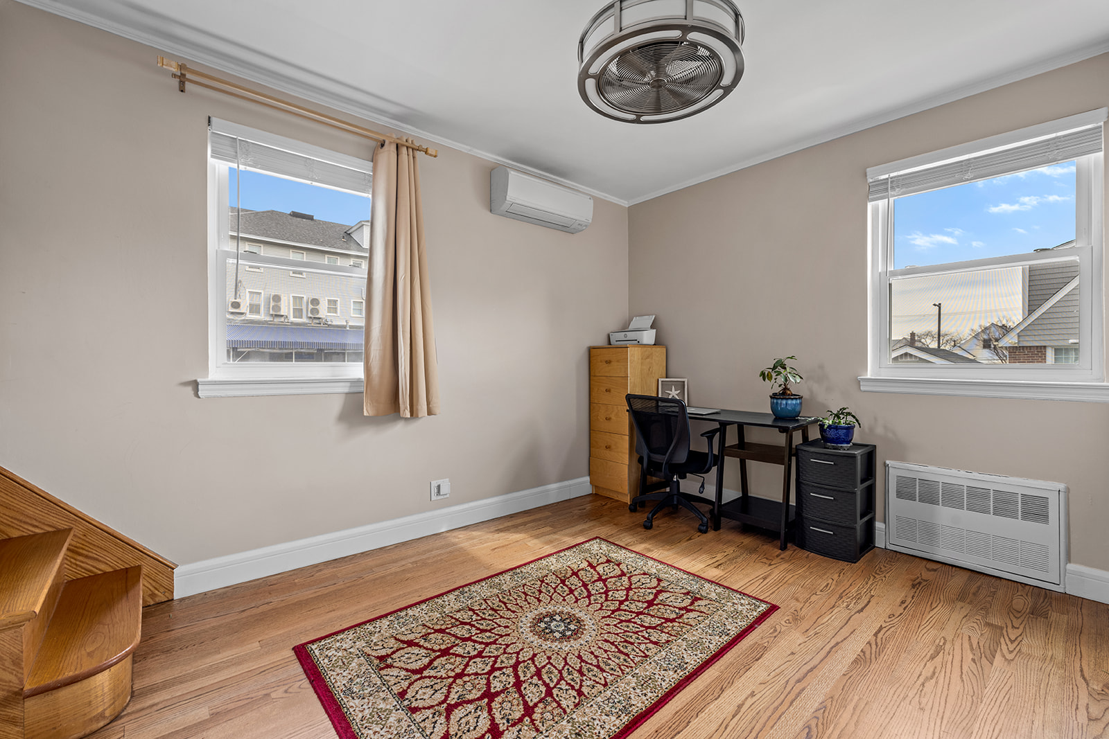 524 Beach 127th Street Queens, NY 11694 - Photo 8 of 18 a view of a workspace with furniture and a window