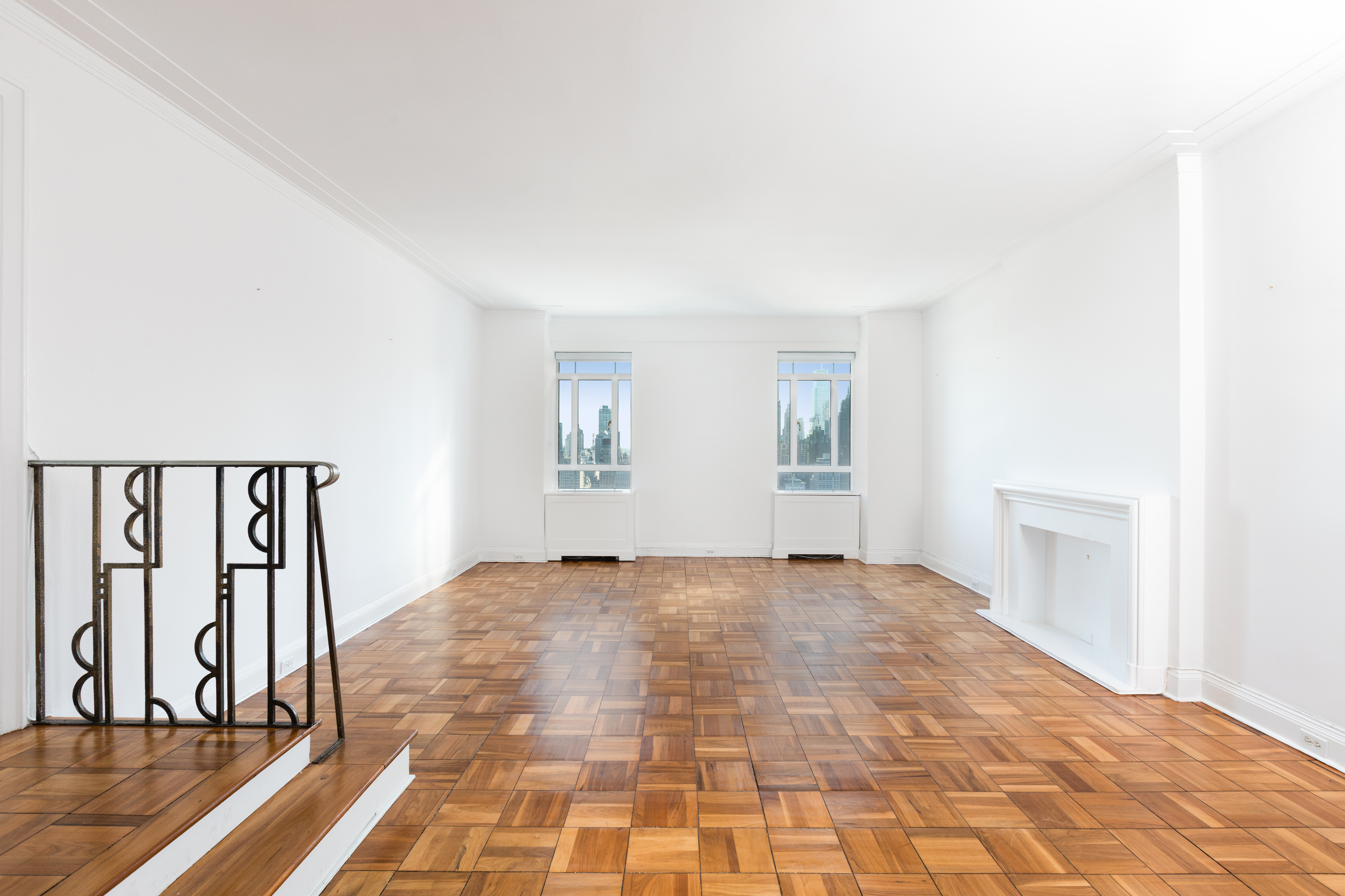 25 Central Park West, Unit 25K Manhattan, NY 10023 - Photo 2 of 14 a view of a room with wooden floor and windows