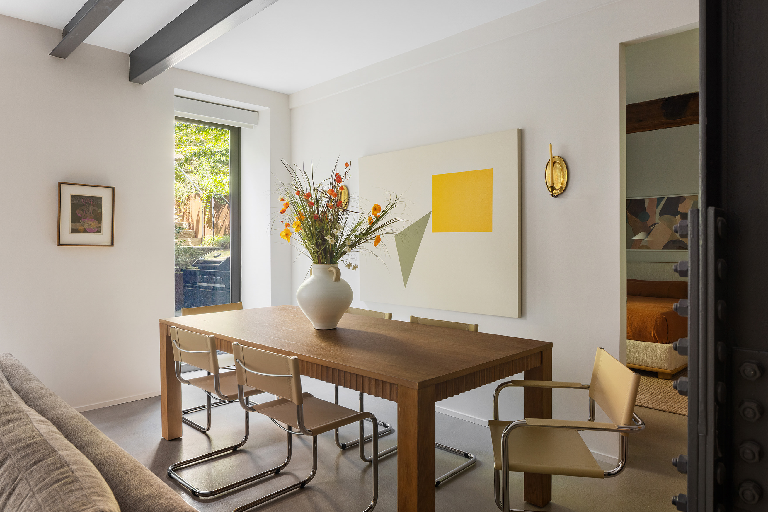 168 Plymouth Street, Unit GARDEN Brooklyn, NY 11201 - Photo 10 of 23 a view of a dining room with furniture and window