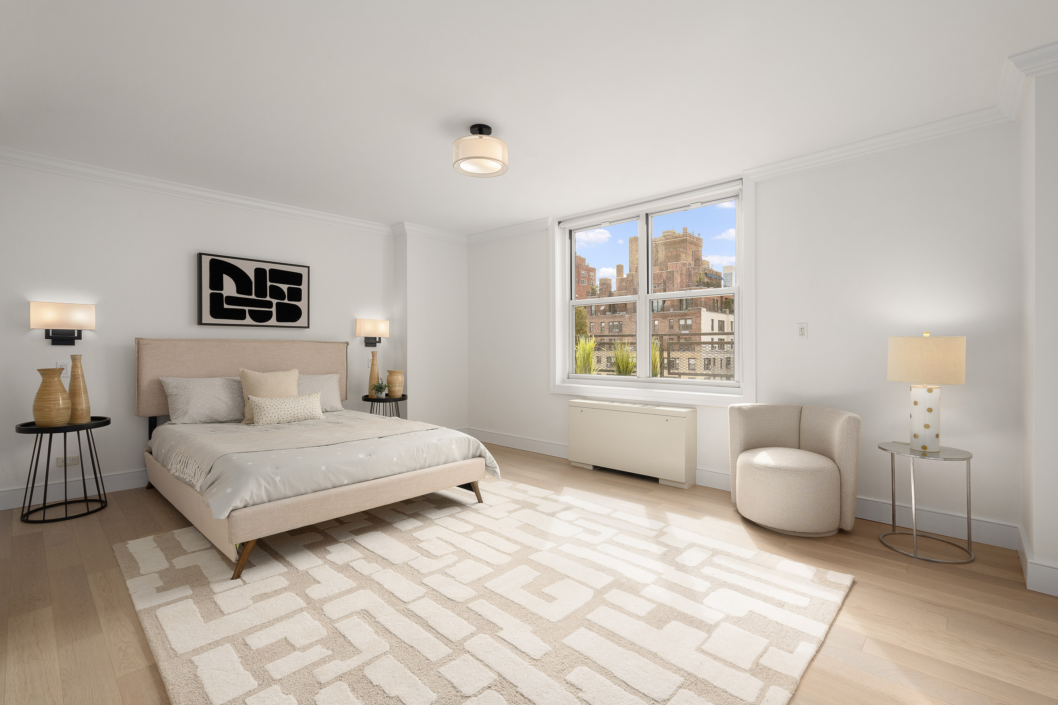 207 East 74th Street, Unit 11E Manhattan, NY 10021 - Photo 9 of 20 a bedroom with a bed and a window