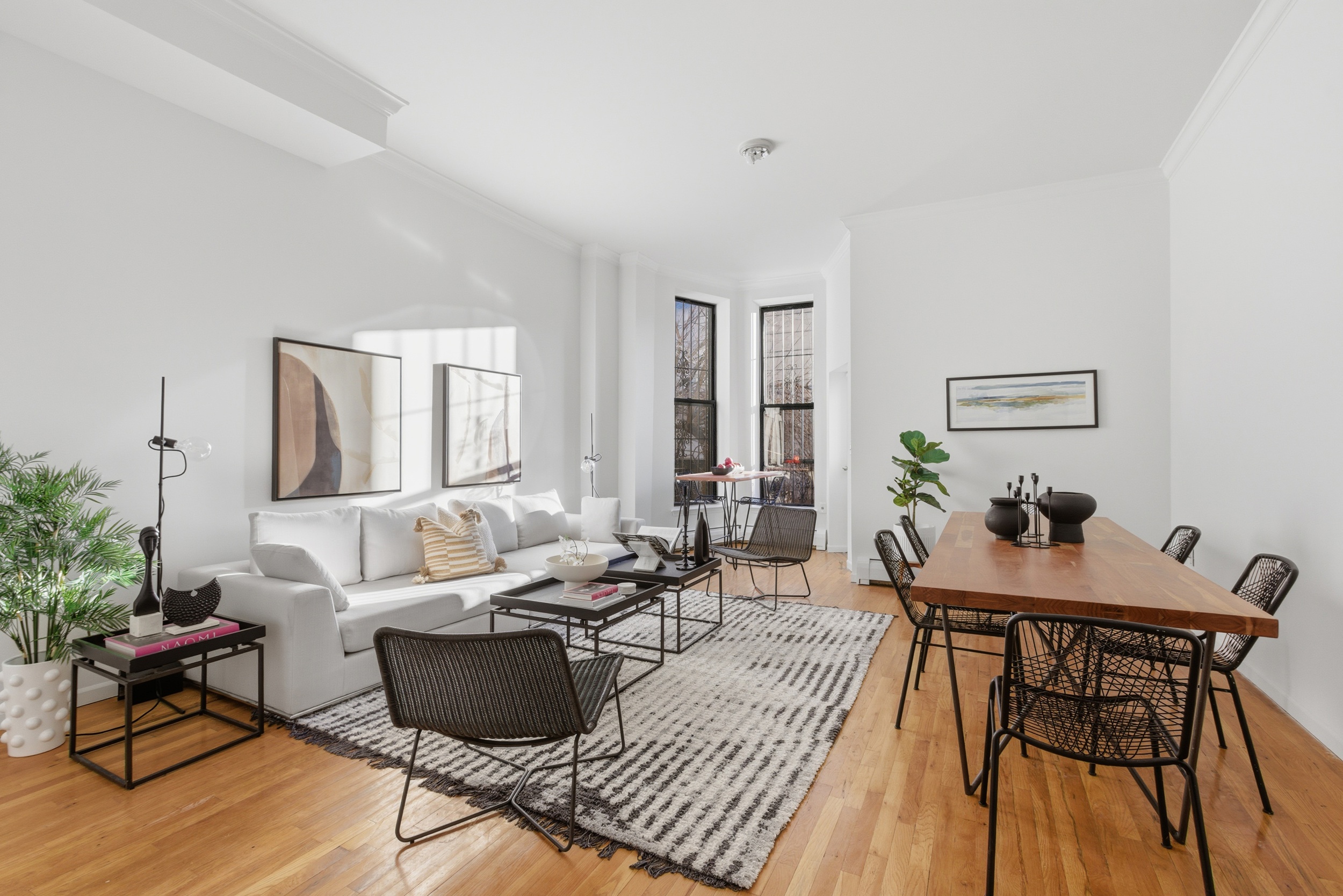 20 East 126th Street Manhattan, NY 10035 - Photo 2 of 19 a living room with furniture and a wooden floor