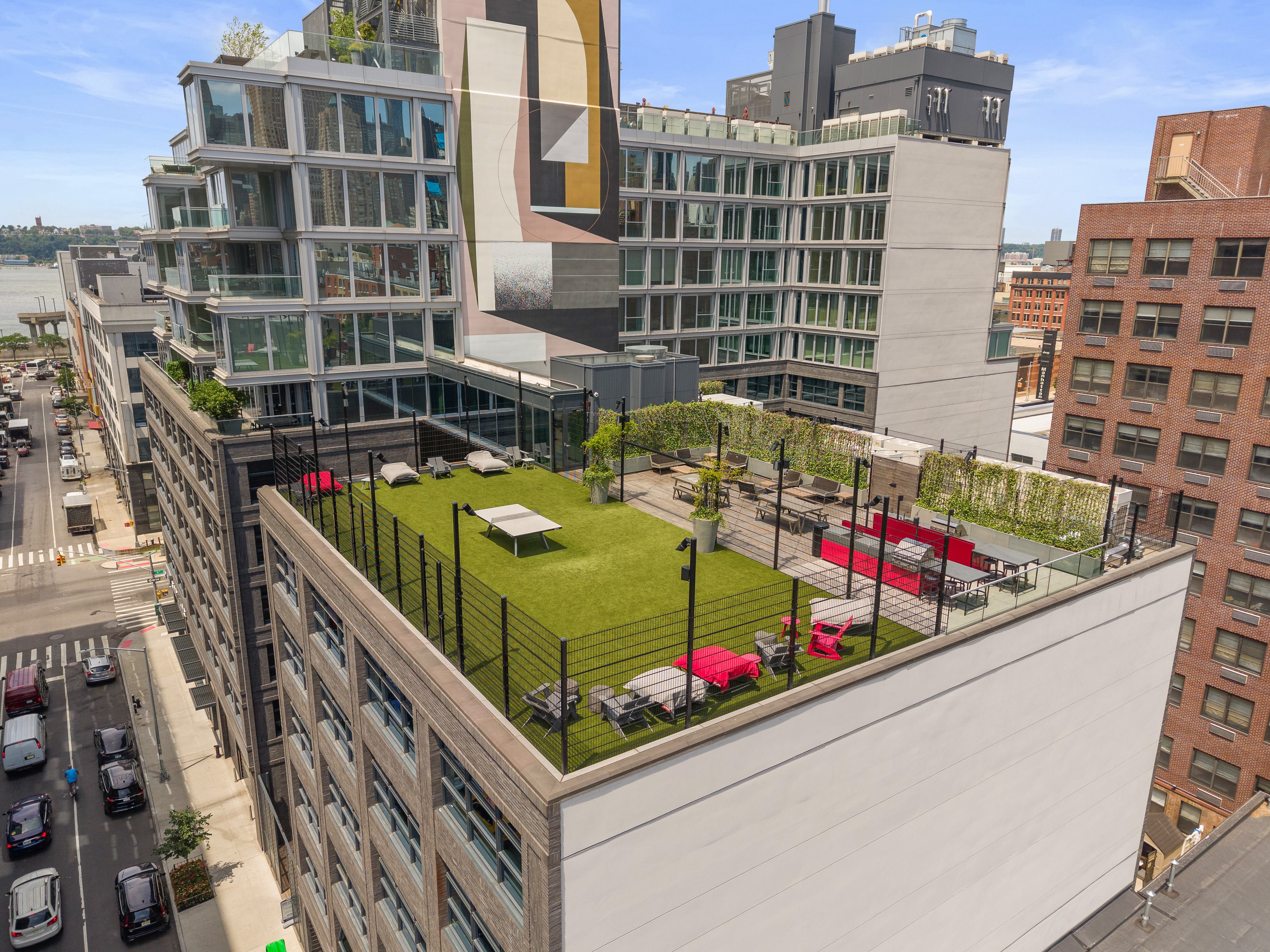 547 West 47th Street, Unit 509 Manhattan, NY 10036 - Photo 22 of 29 a view of roof with a sitting area and potted plants