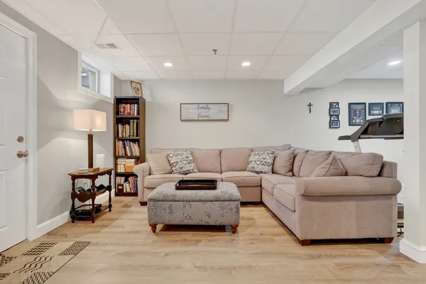 a living room with furniture and a couch