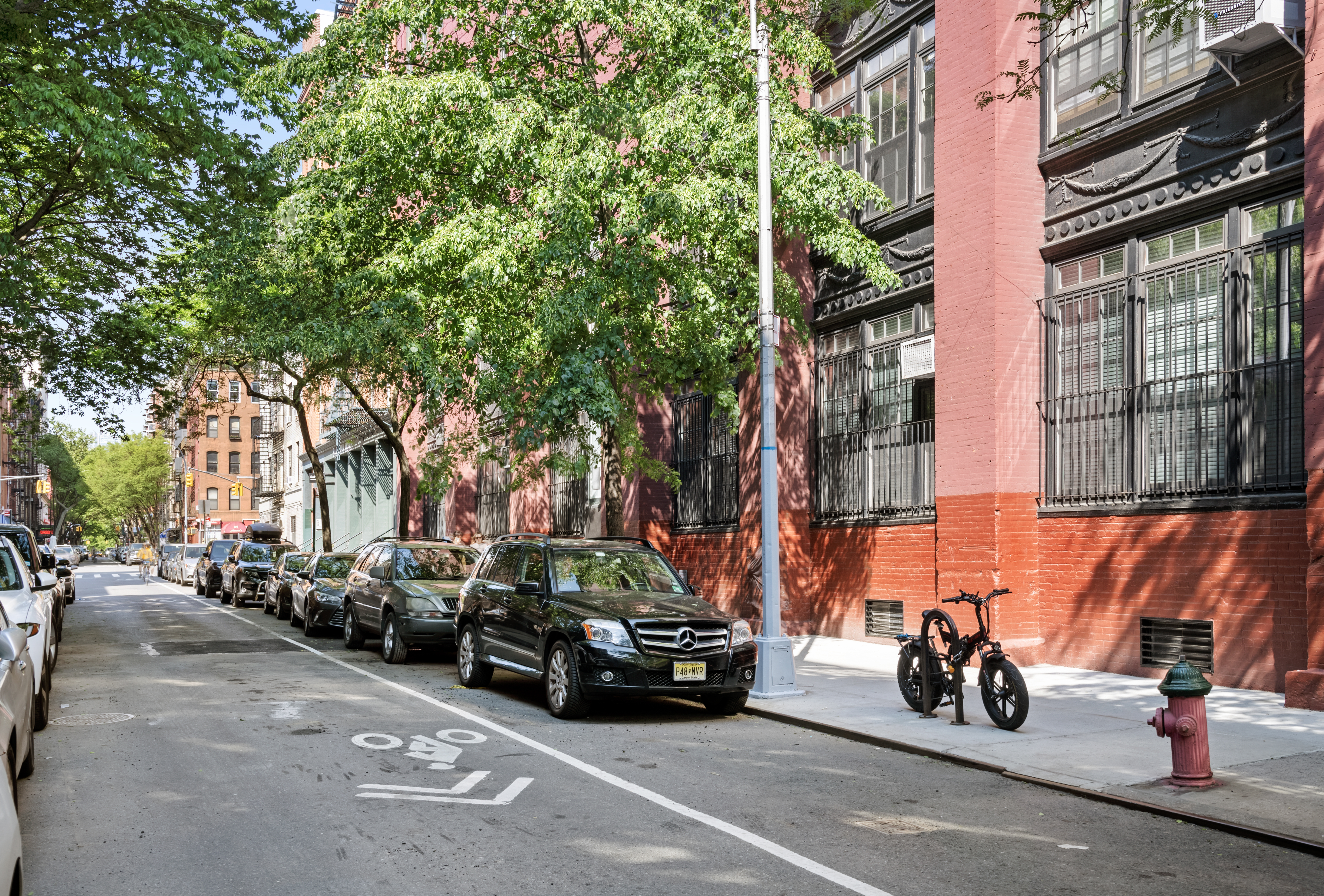 140 Thompson, Unit 4A Manhattan, NY 10012 - Photo 12 of 13 a view of a street with cars
