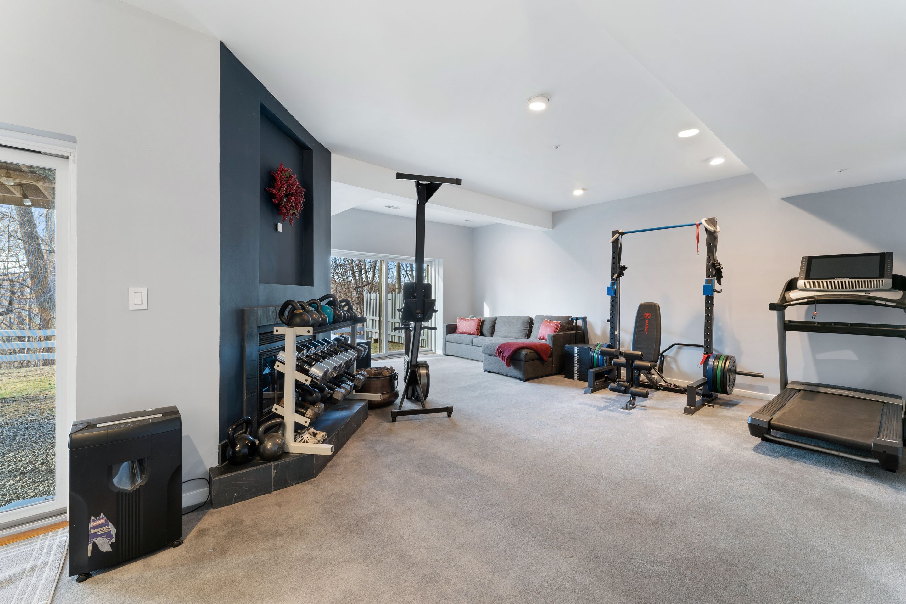 124 Boulder Ridge Road Scarsdale, NY 10583 - Photo 19 of 31 a view of a room with gym equipment