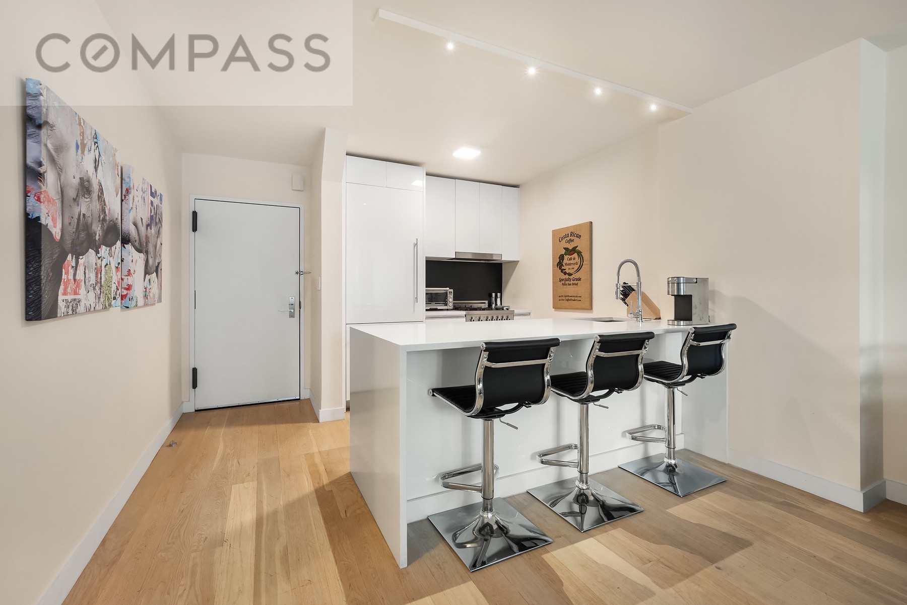 301 West 53rd Street, Unit 7H Manhattan, NY 10019 - Photo 3 of 11 a view of a workspace with furniture