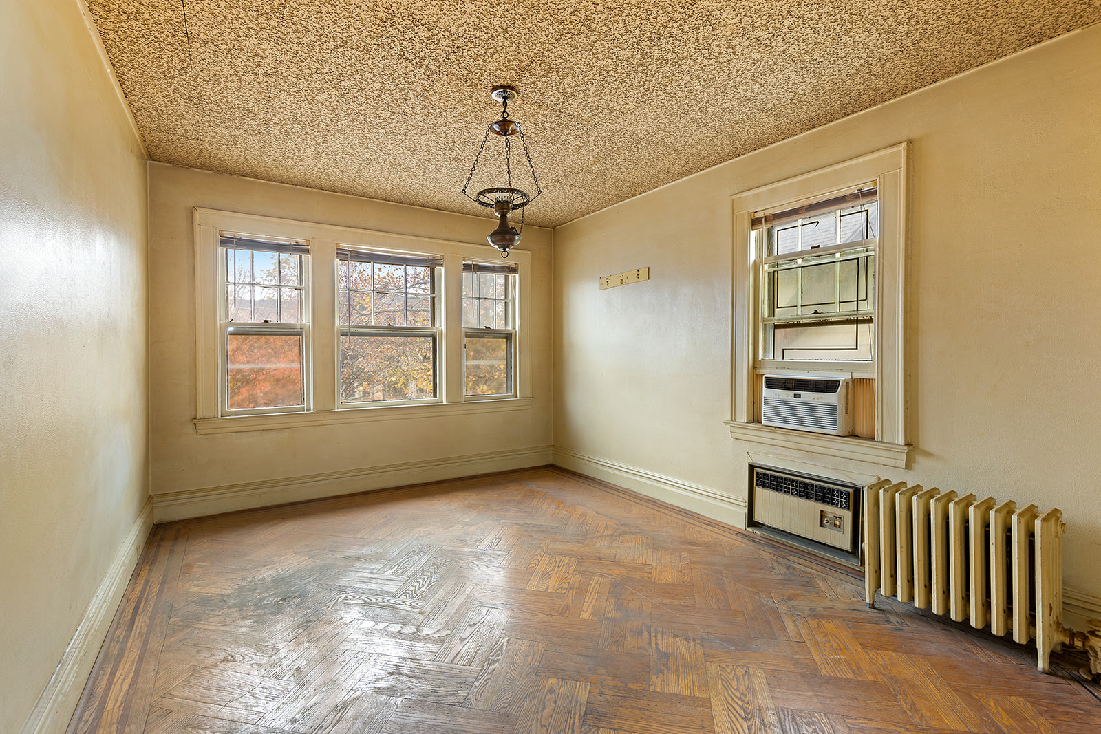 2411 Avenue M Brooklyn, NY 11210 - Photo 6 of 12 a view of an empty room with a window