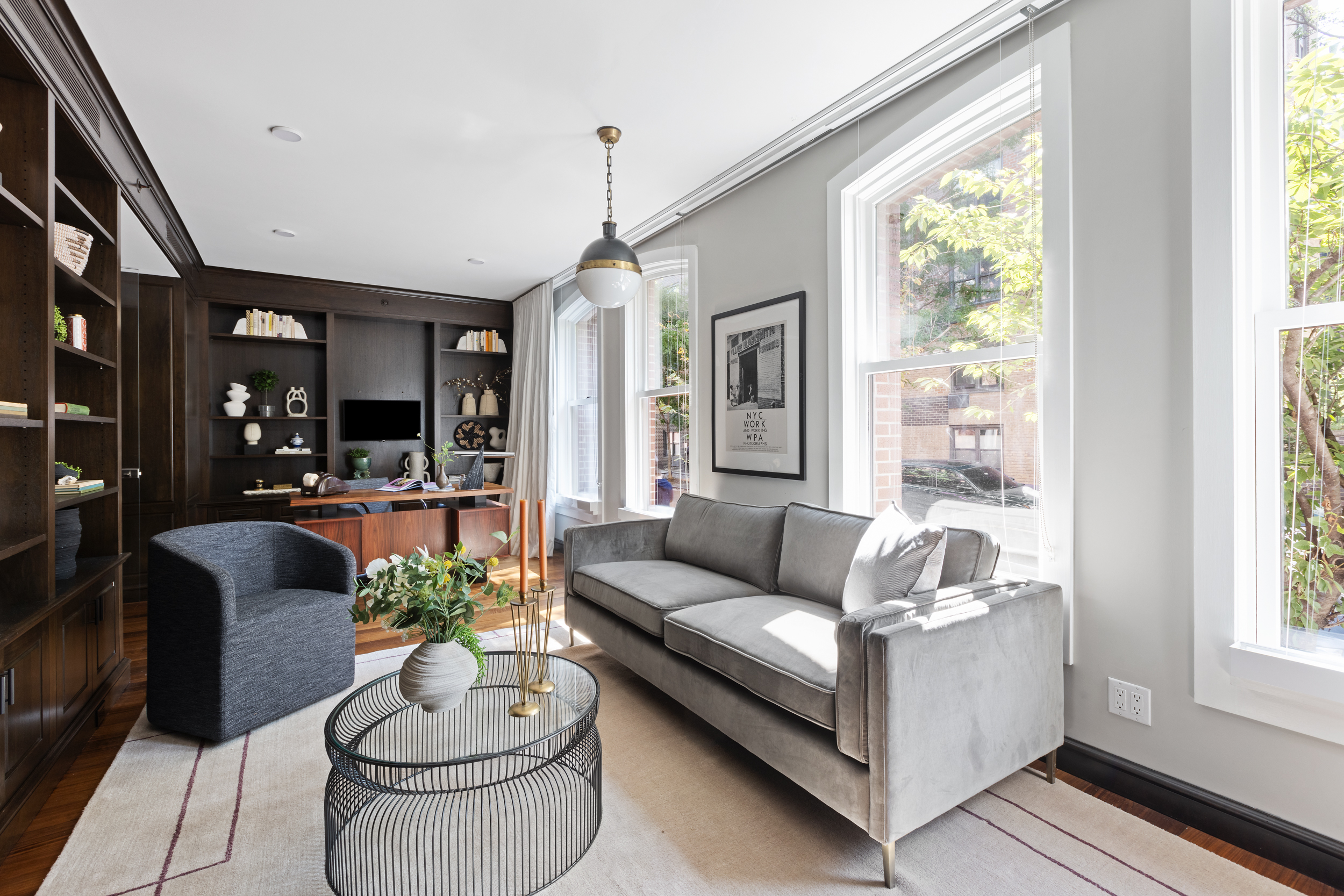 95 Charles Street, Unit TH Manhattan, NY 10014 - Photo 12 of 29 a living room with furniture and a large window